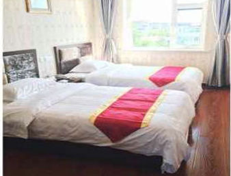 Guest room at the Super 8 by Wyndham Huludao Long Wan Hai Bin in Huludao, Other than US/Canada