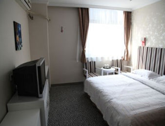 Guest room at the Super 8 by Wyndham Lianyungang Long Hai Dong Lu Da Run Fa in Lianyungang, Other than US/Canada