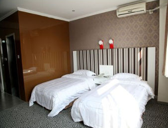 Guest room at the Super 8 by Wyndham Lianyungang Long Hai Dong Lu Da Run Fa in Lianyungang, Other than US/Canada