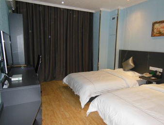 Guest room at the Super 8 by Wyndham Longnan Wudu Pan Xuan Lu Square in Longnan, Other than US/Canada