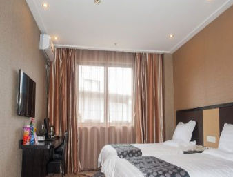 Guest room at the Super 8 by Wyndham Hai Men Trade Walking Street in Nantong, Jiangsu, Other than US/Canada