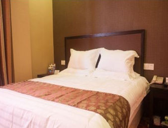 Guest room at the Super 8 by Wyndham Hai Men Trade Walking Street in Nantong, Jiangsu, Other than US/Canada