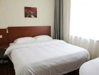 Guest room at the Super 8 by Wyndham Shanghai Jinshan Xuefulu Chengshi Sha Tan in Shanghai, Other than US/Canada