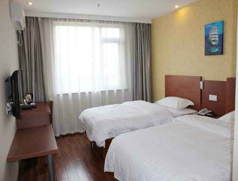 Guest room at the Super 8 by Wyndham Shanghai Jinshan Xuefulu Chengshi Sha Tan in Shanghai, Other than US/Canada