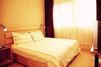 Guest room at the Super 8 Suzhou Jin Han Lin in Suzhou, Other than US/Canada