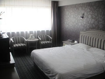 Guest room at the Super 8 by Wyndham Yinchuan Gulou Jin Qiao in Yinchuan, Other than US/Canada