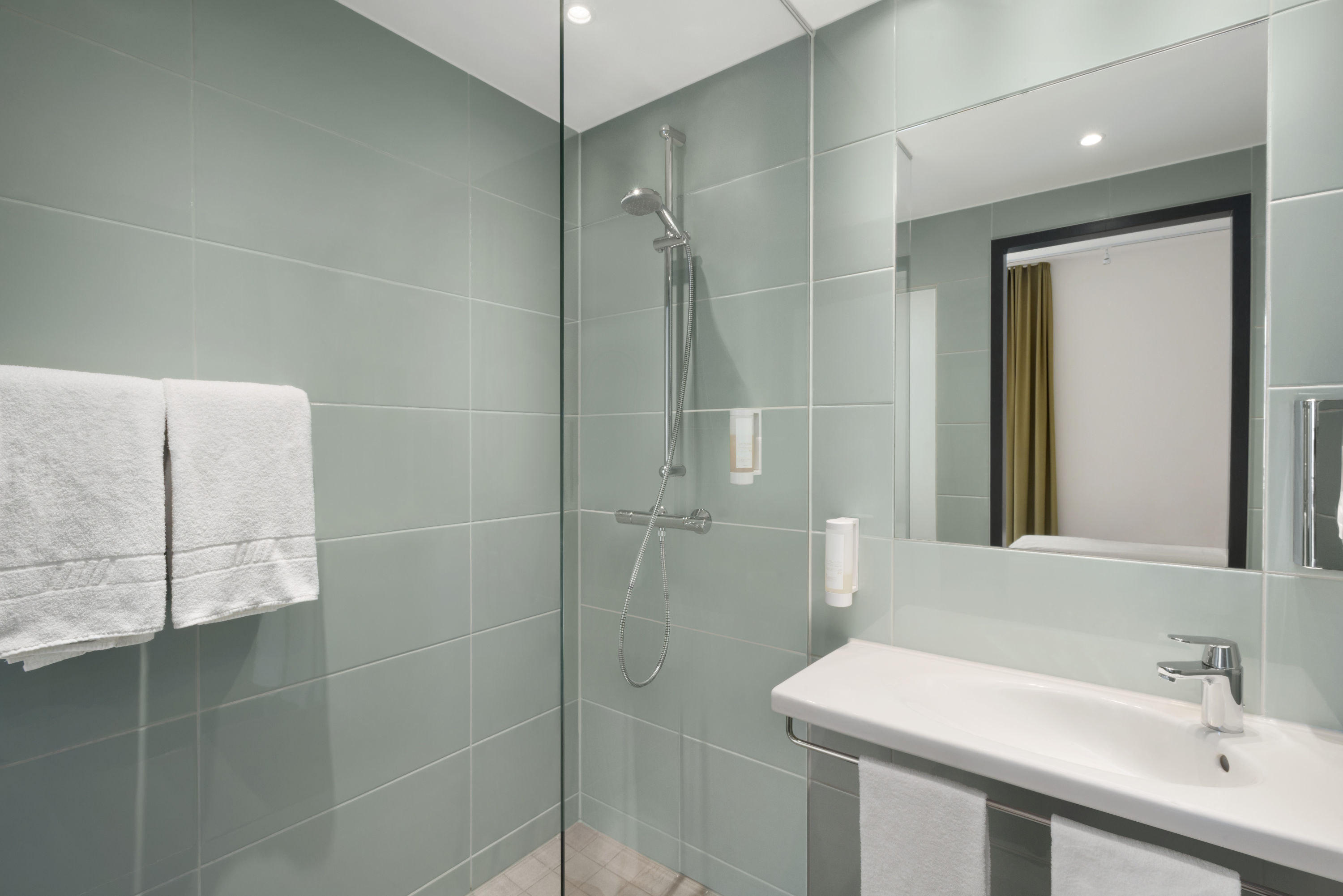 Guest room bath at the Super 8 by Wyndham Munich City West in Munich, Other than US/Canada