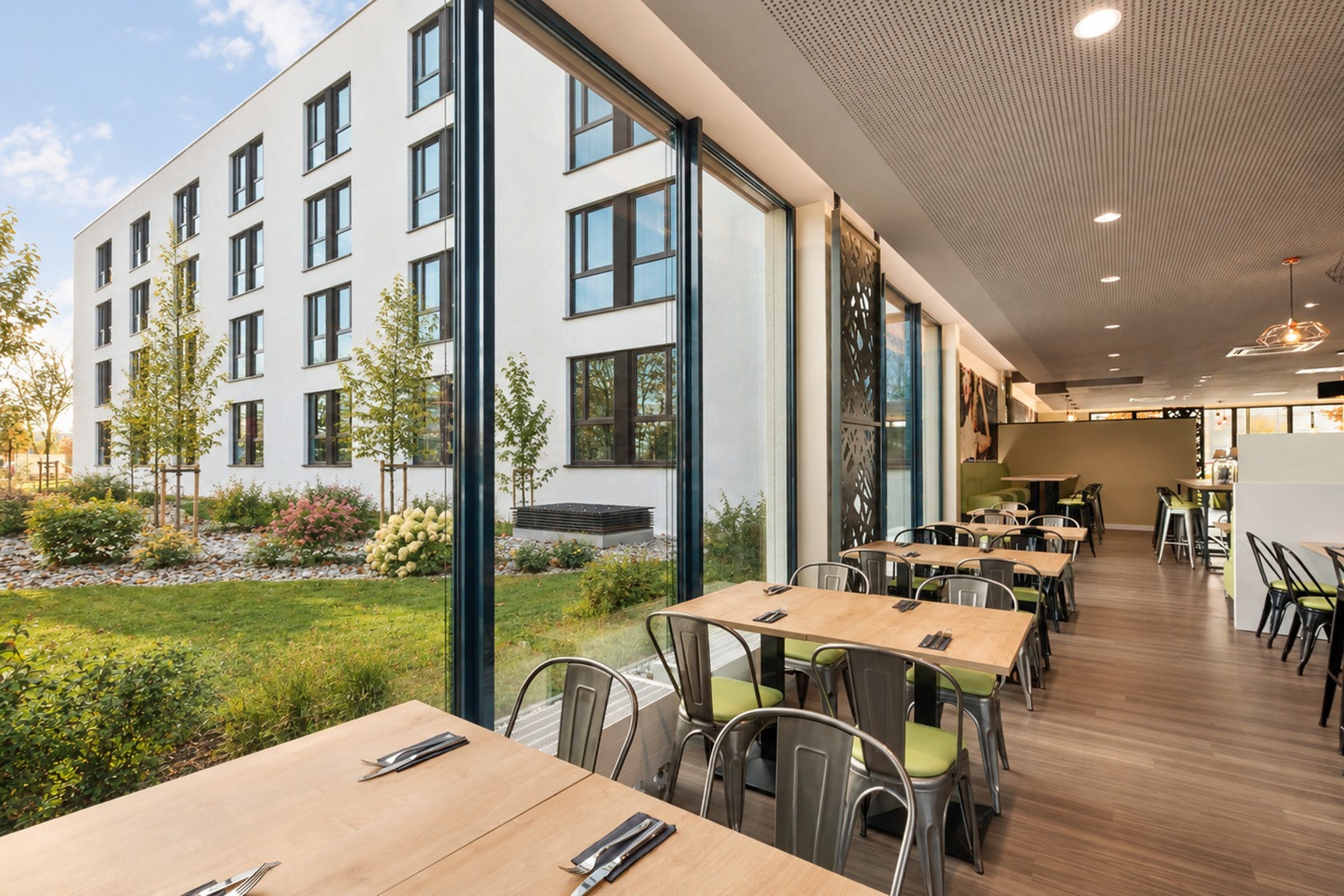 Super 8 by Wyndham Munich City North restaurant breakfast area with seating in Munich, Other than US/Canada
