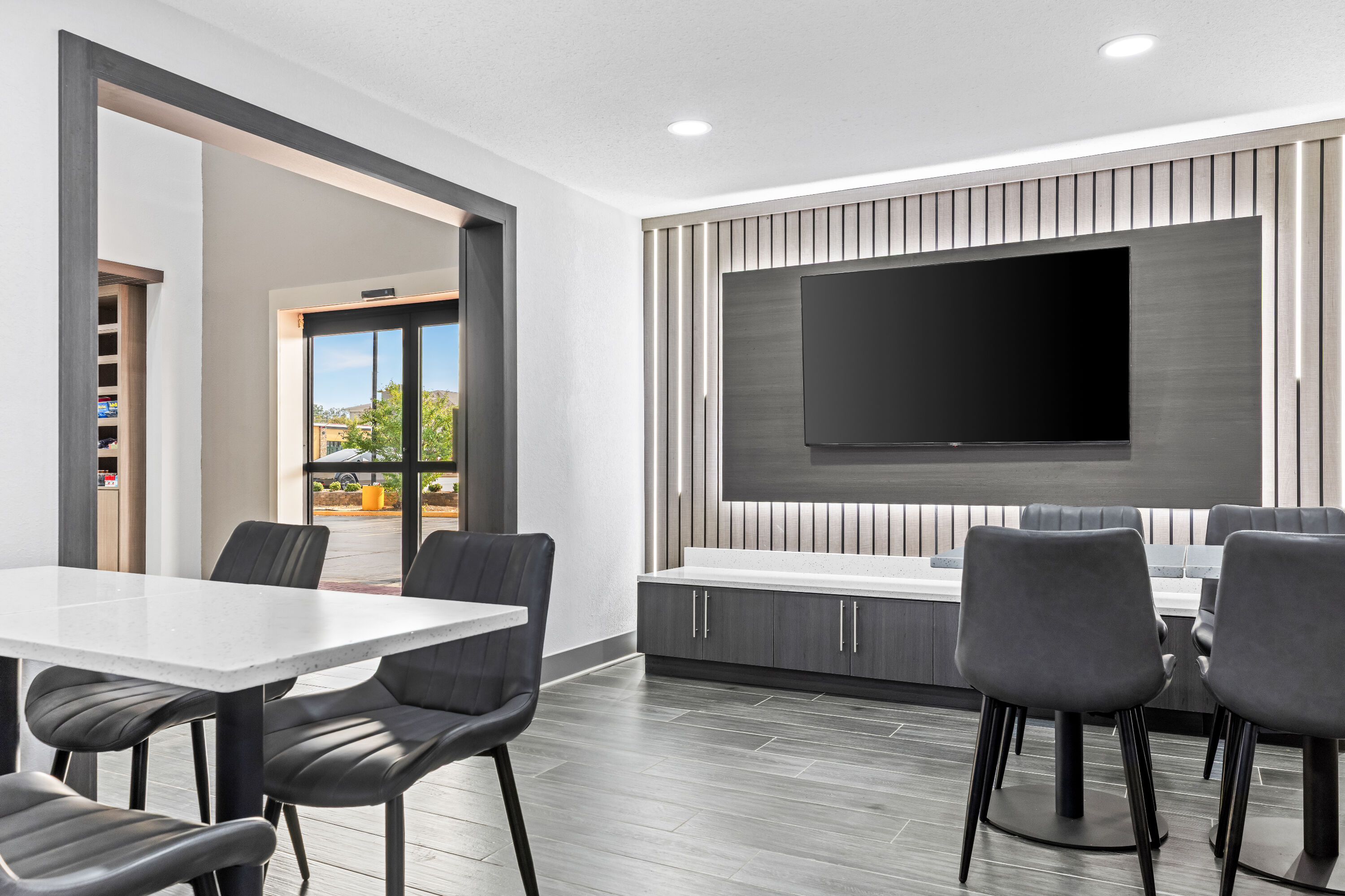 Super 8 by Wyndham Athens restaurant breakfast area with seating in Athens, Alabama