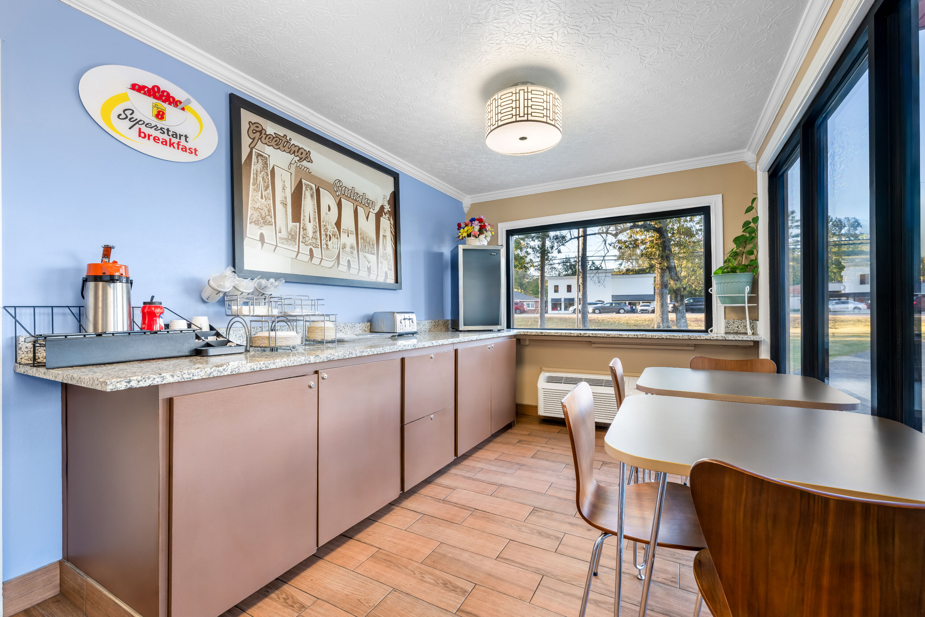 Super 8 by Wyndham Gadsden AL restaurant breakfast area with seating in Gadsden, Alabama