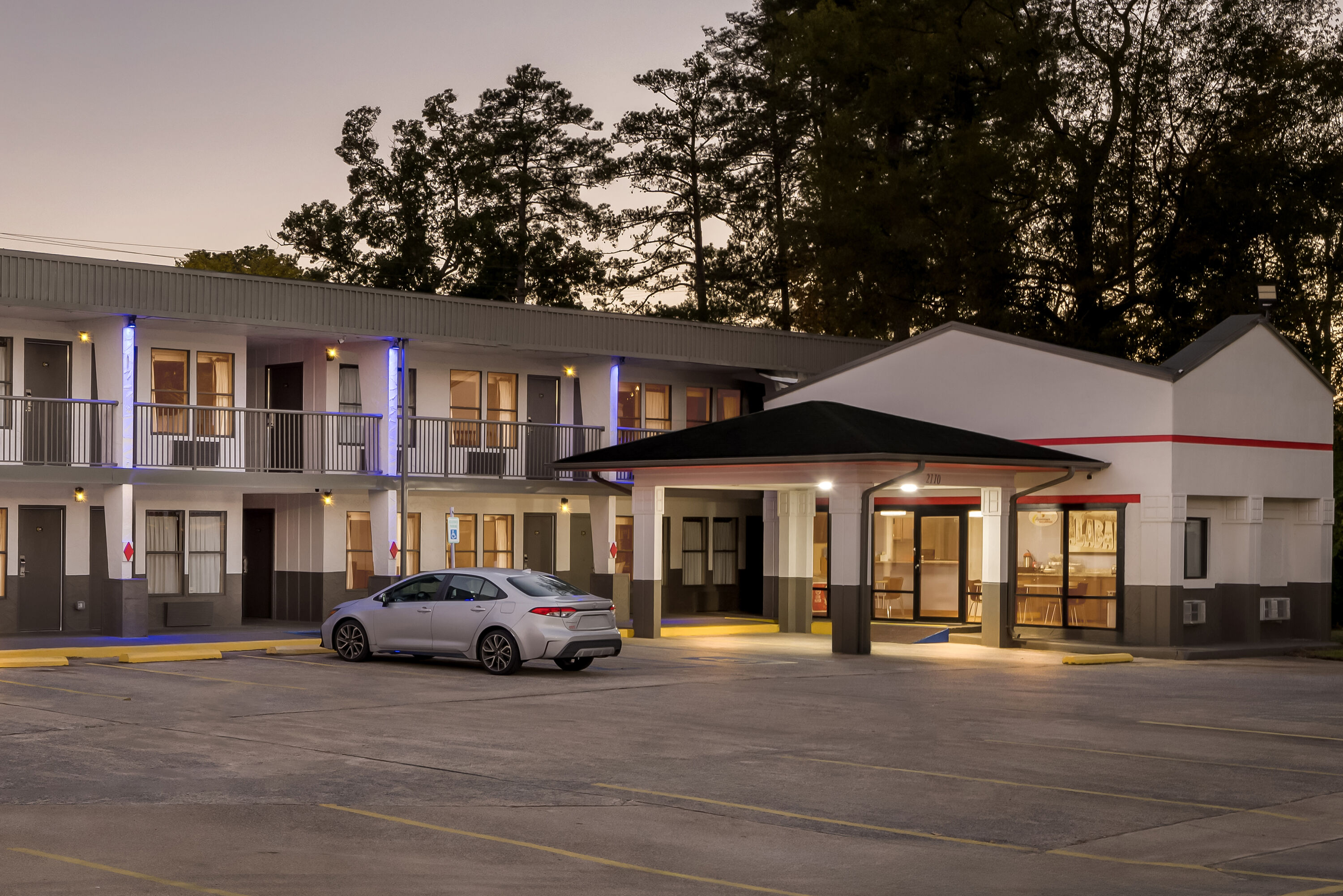 Exterior Night Image of Super 8 by Wyndham Gadsden AL hotel in Gadsden, Alabama
