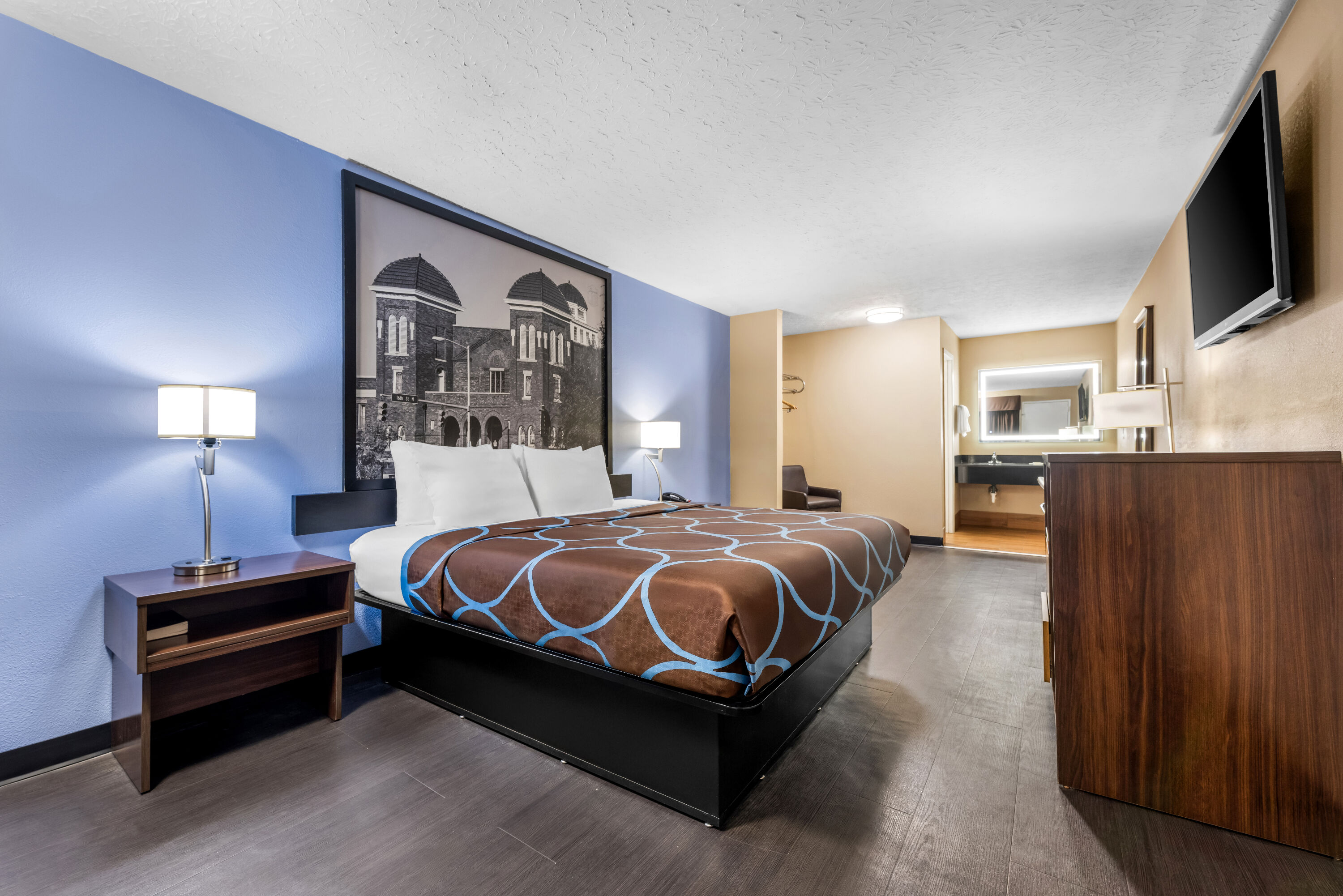 King bed guest room at the Super 8 by Wyndham Gadsden AL in Gadsden, Alabama