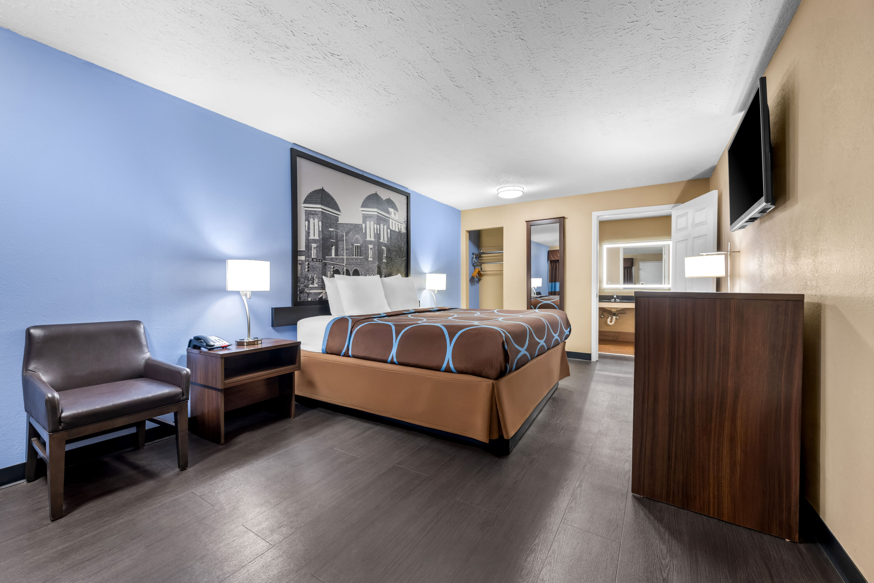 King bed guest room at the Super 8 by Wyndham Gadsden AL in Gadsden, Alabama