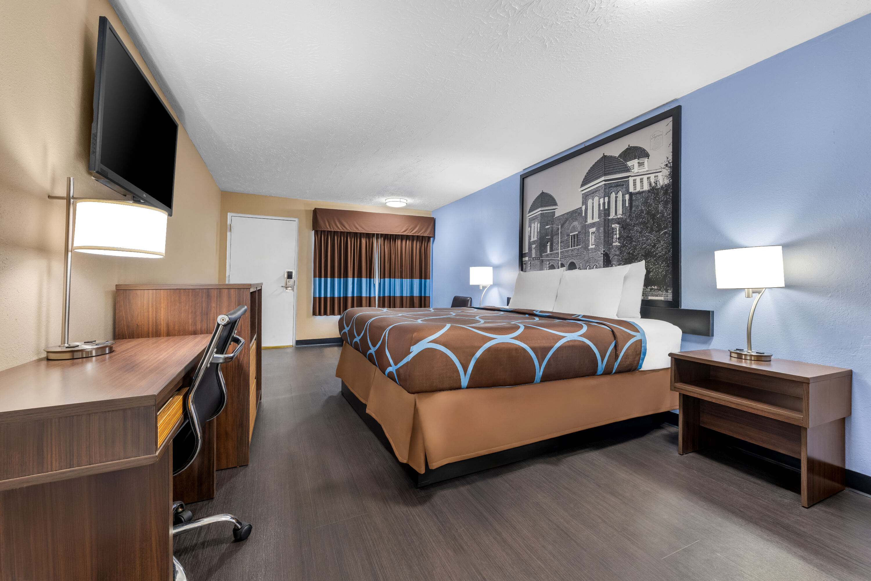 King bed guest room at the Super 8 by Wyndham Gadsden AL in Gadsden, Alabama