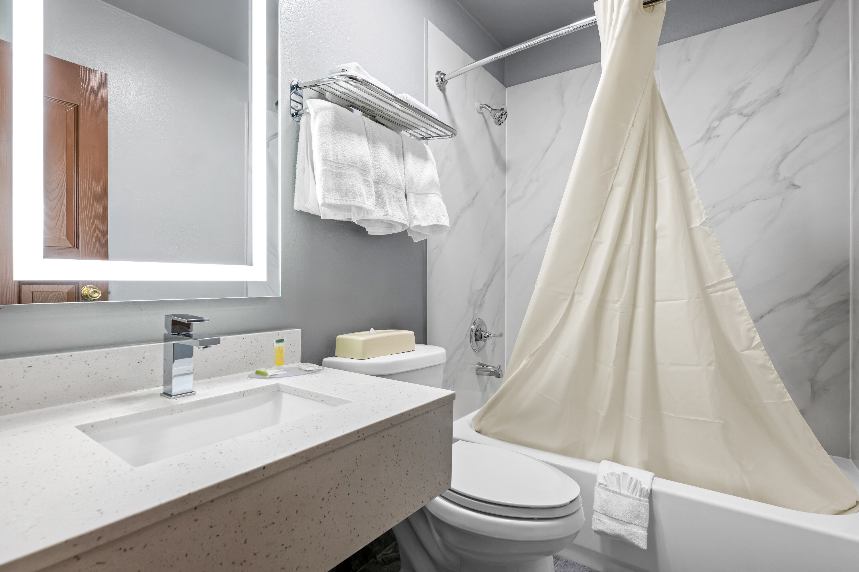 Guest room bath at the Super 8 by Wyndham Homewood Birmingham Area in Homewood, Alabama