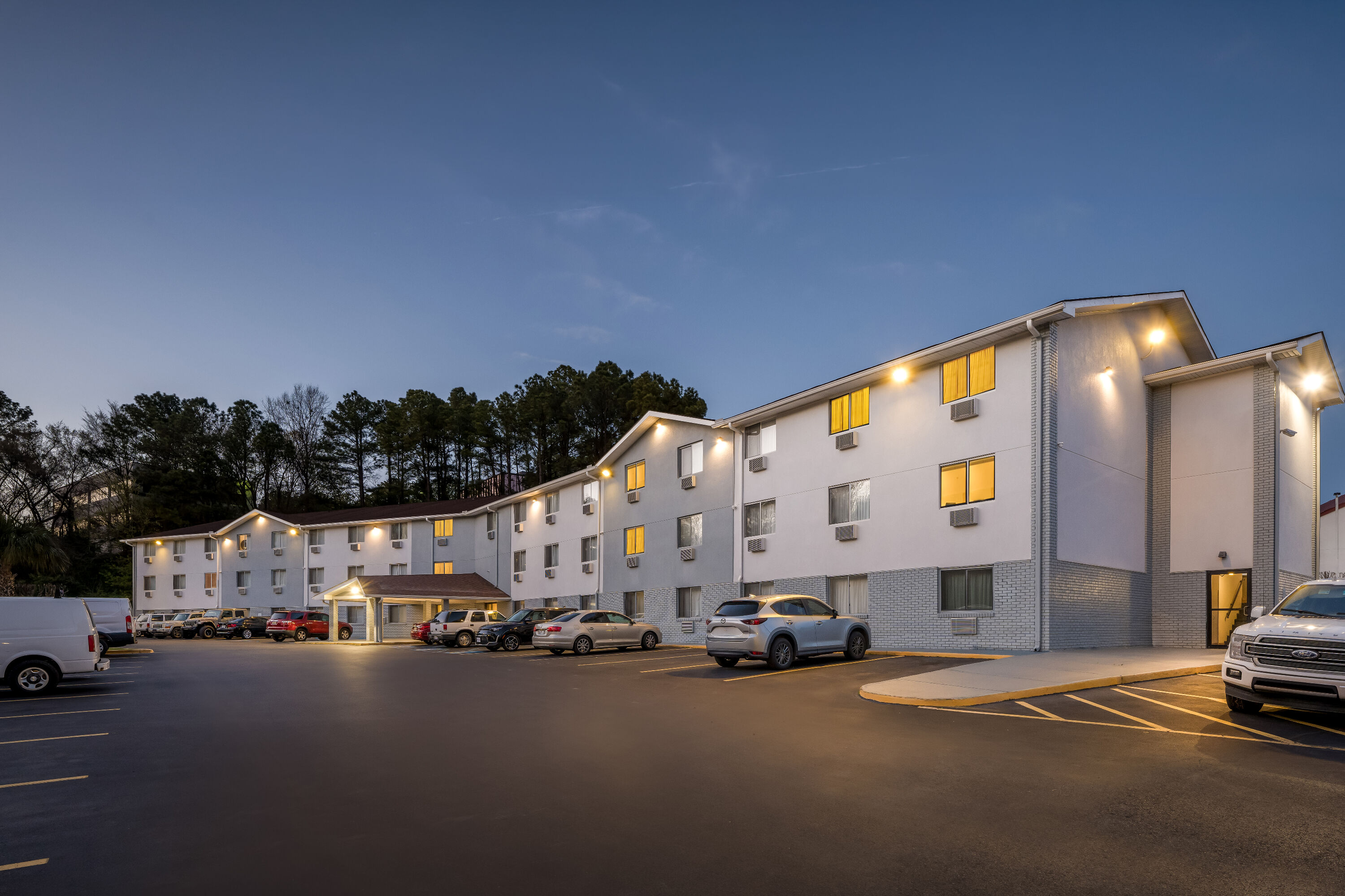 Exterior Night Image of Super 8 by Wyndham Homewood Birmingham Area hotel in Homewood, Alabama