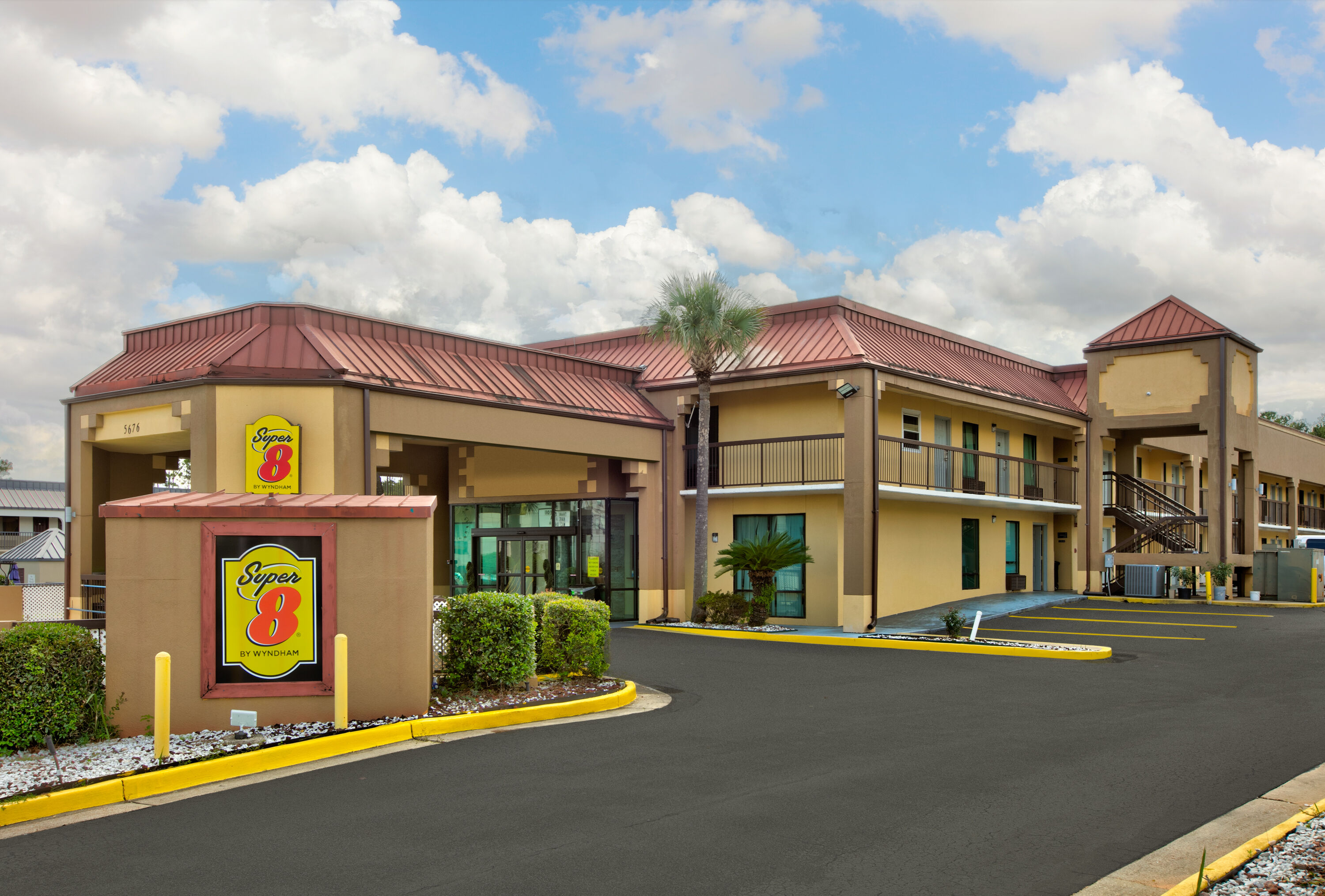 Exterior Day Image of Super 8 by Wyndham Mobile/Tillmans Corner hotel in Mobile, Alabama
