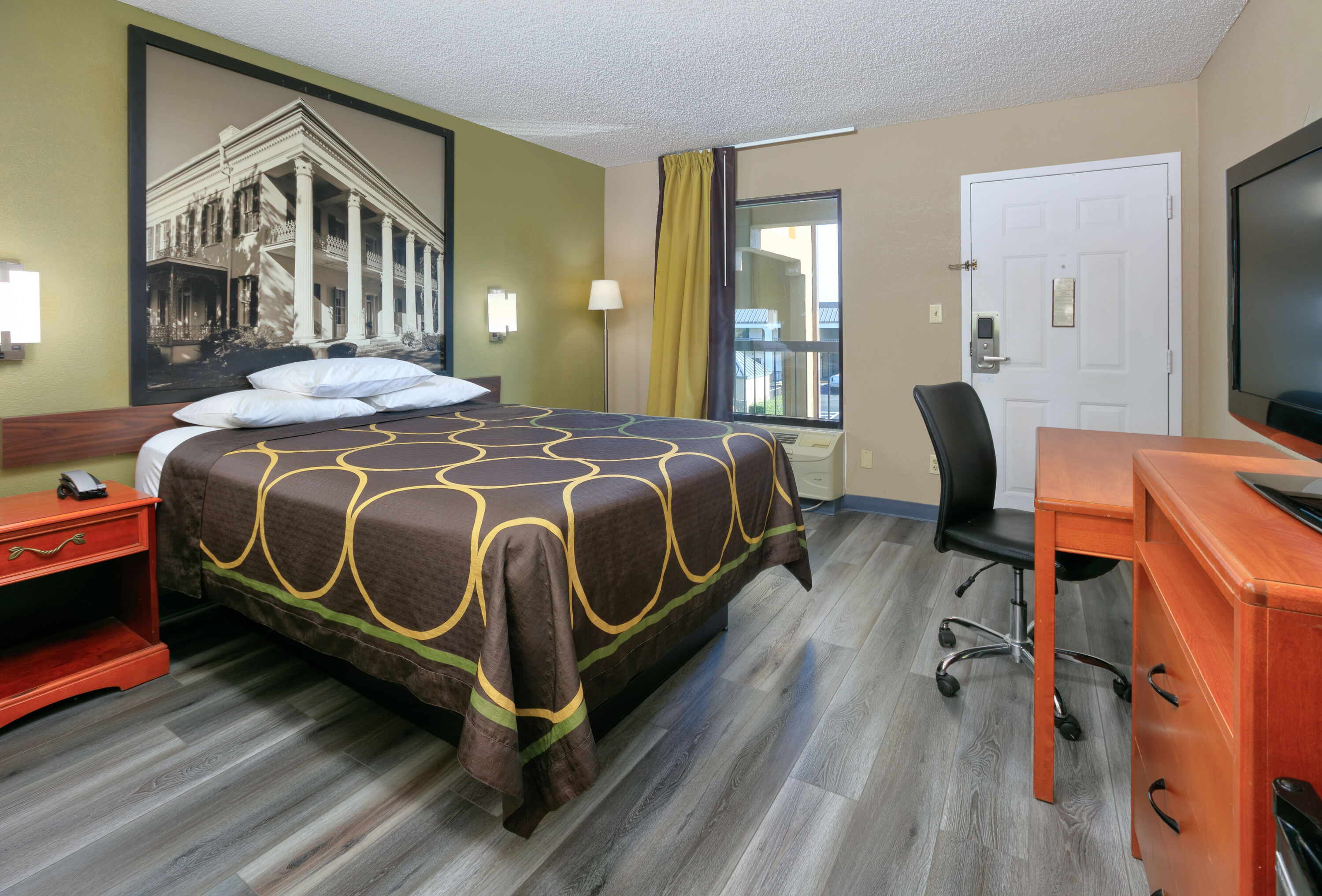 Guest room at the Super 8 by Wyndham Mobile/Tillmans Corner in Mobile, Alabama