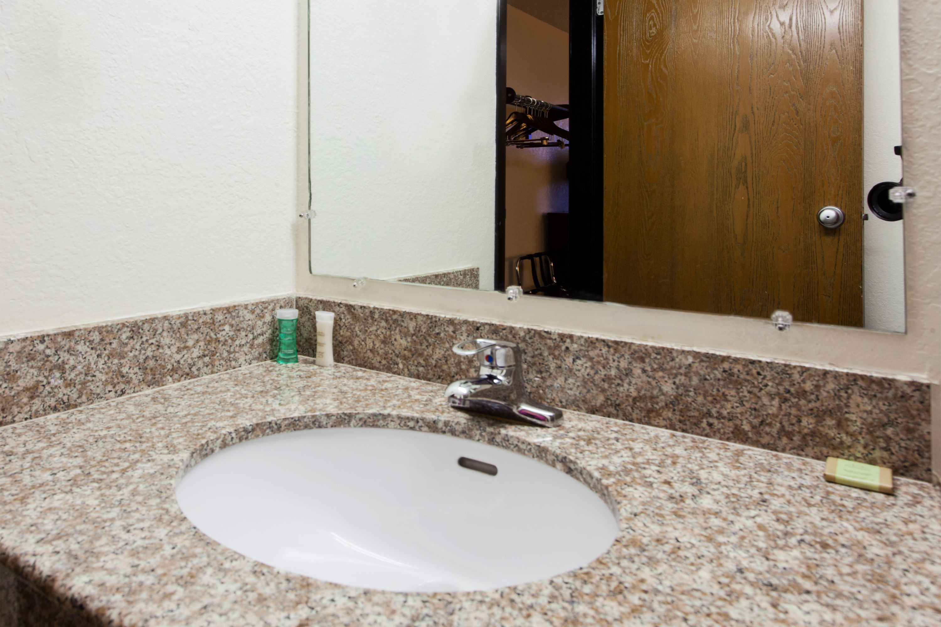 Guest room bath at the Super 8 by Wyndham Tuscaloosa in Tuscaloosa, Alabama