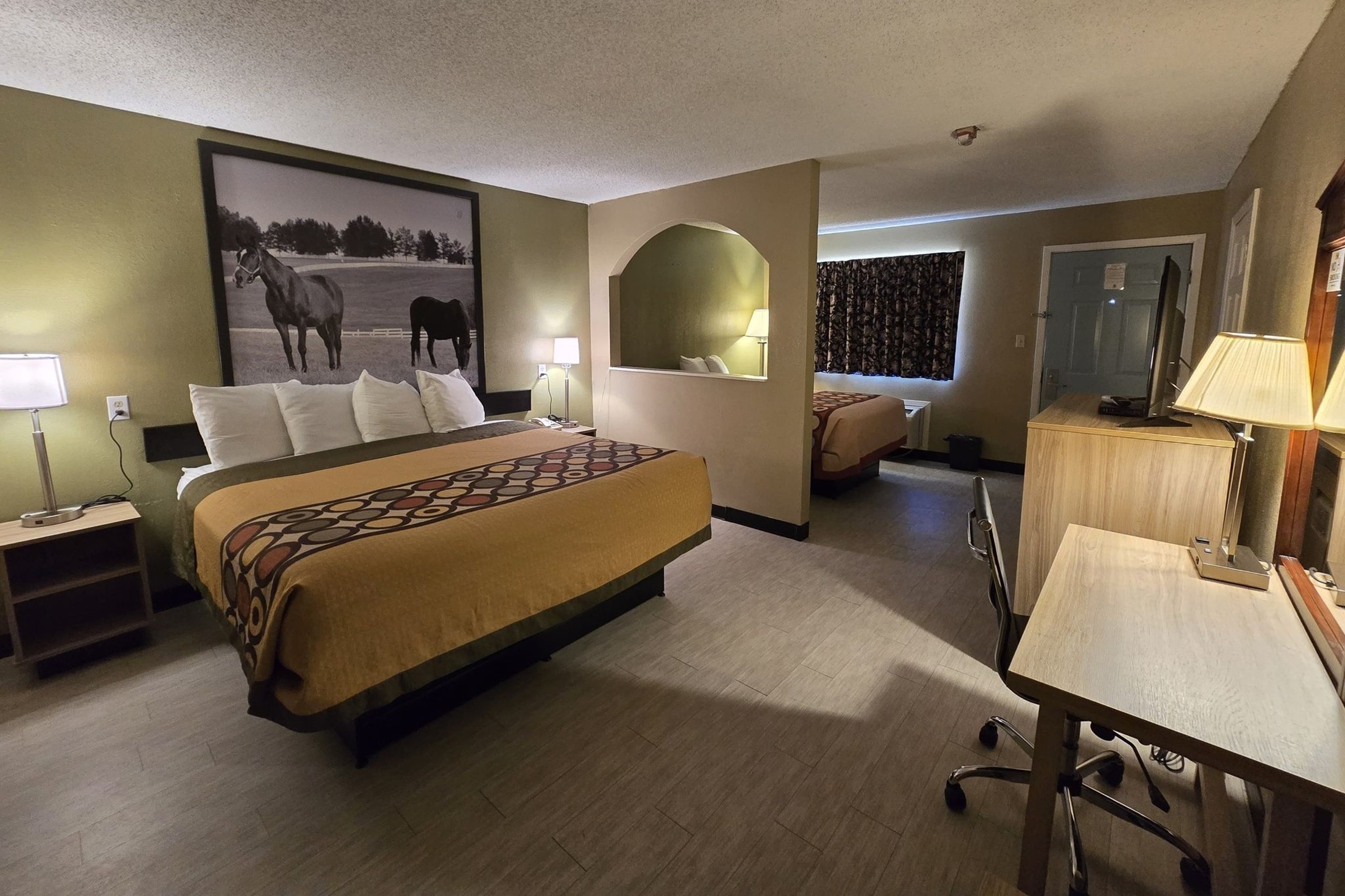 Guest room at the Super 8 by Wyndham Arkadelphia Caddo Valley Area in Arkadelphia, Arkansas