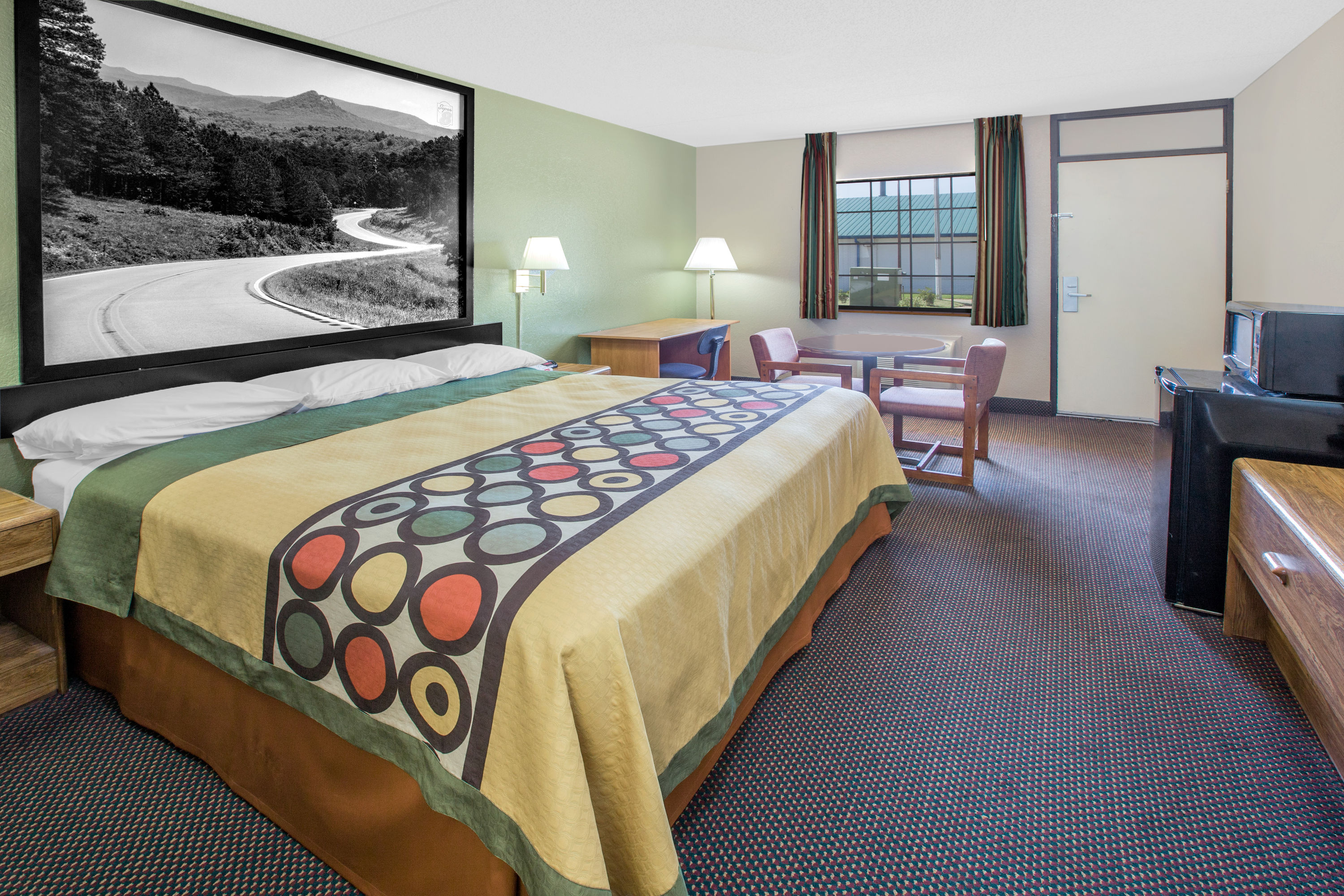 Guest room at the Super 8 by Wyndham Clarksville AR in Clarksville, Arkansas