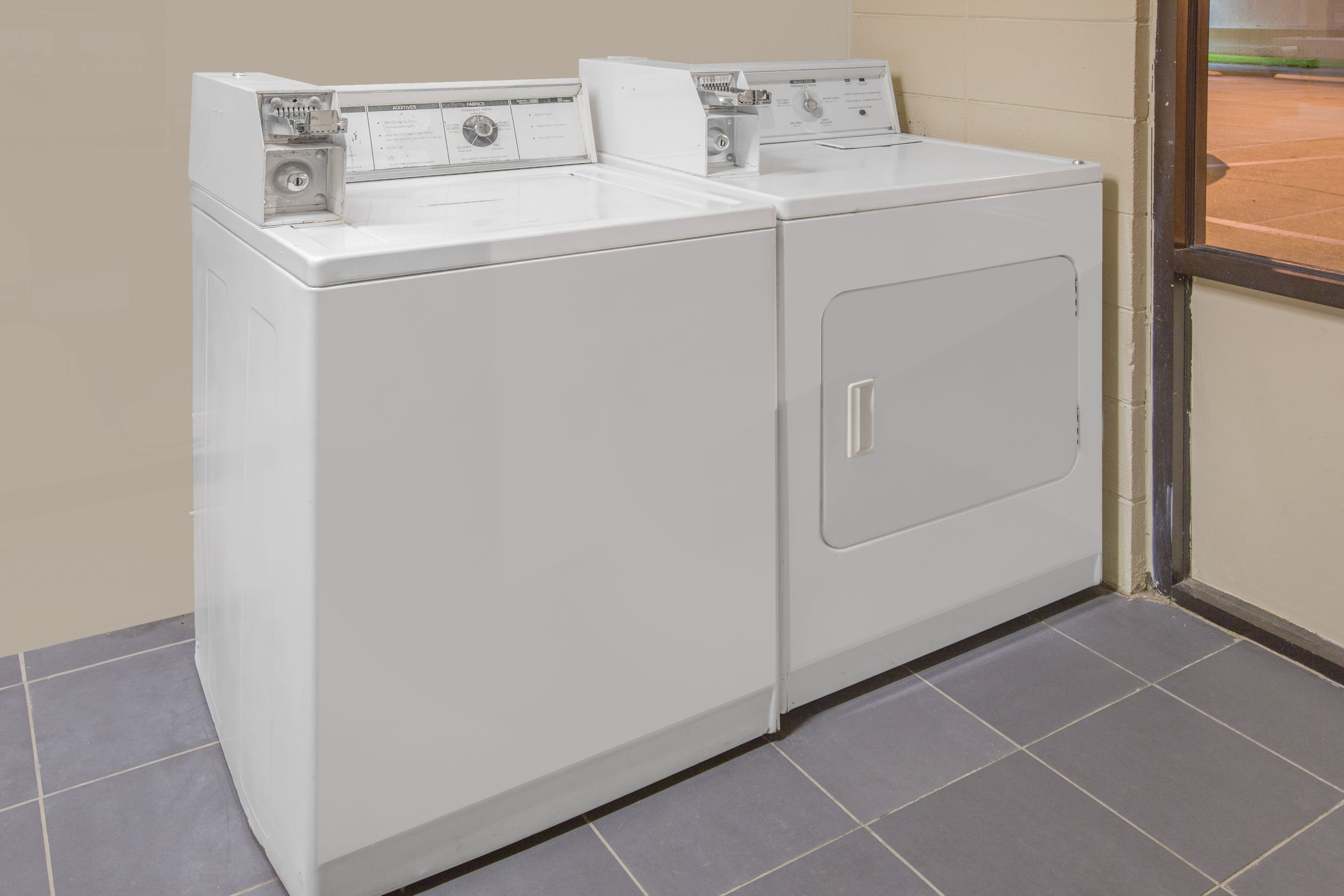 Laundry facilities at Super 8 by Wyndham Clarksville AR in Clarksville, Arkansas