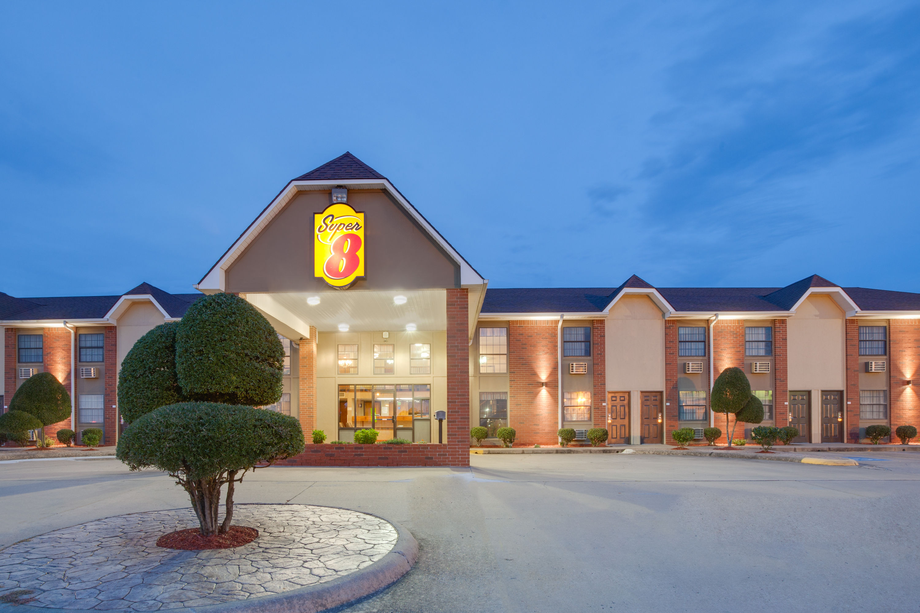 Exterior Dusk Image of Super 8 by Wyndham Morrilton hotel in Morrilton, Arkansas