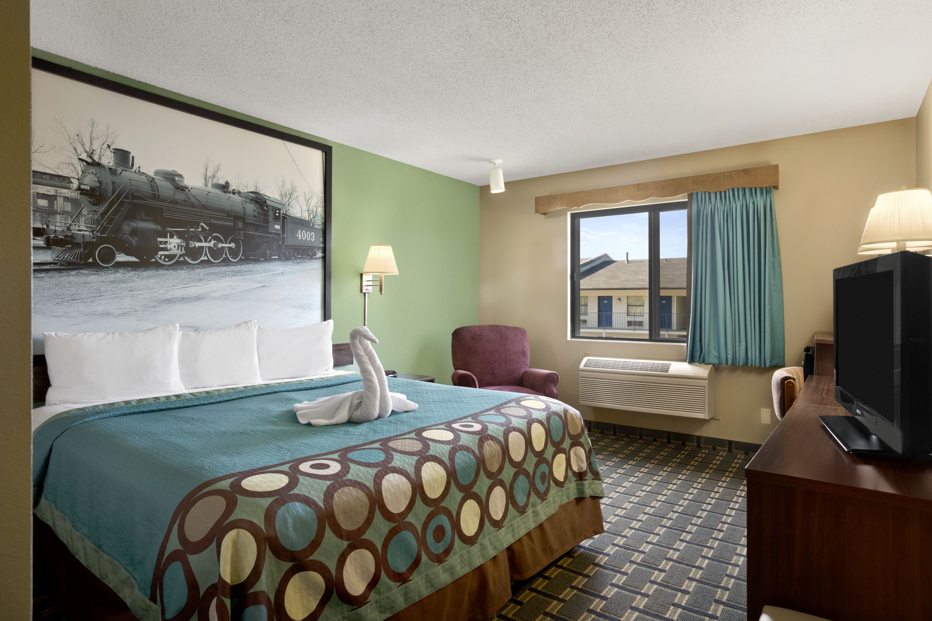 Guest room at the Super 8 by Wyndham Russellville in Russellville, Arkansas