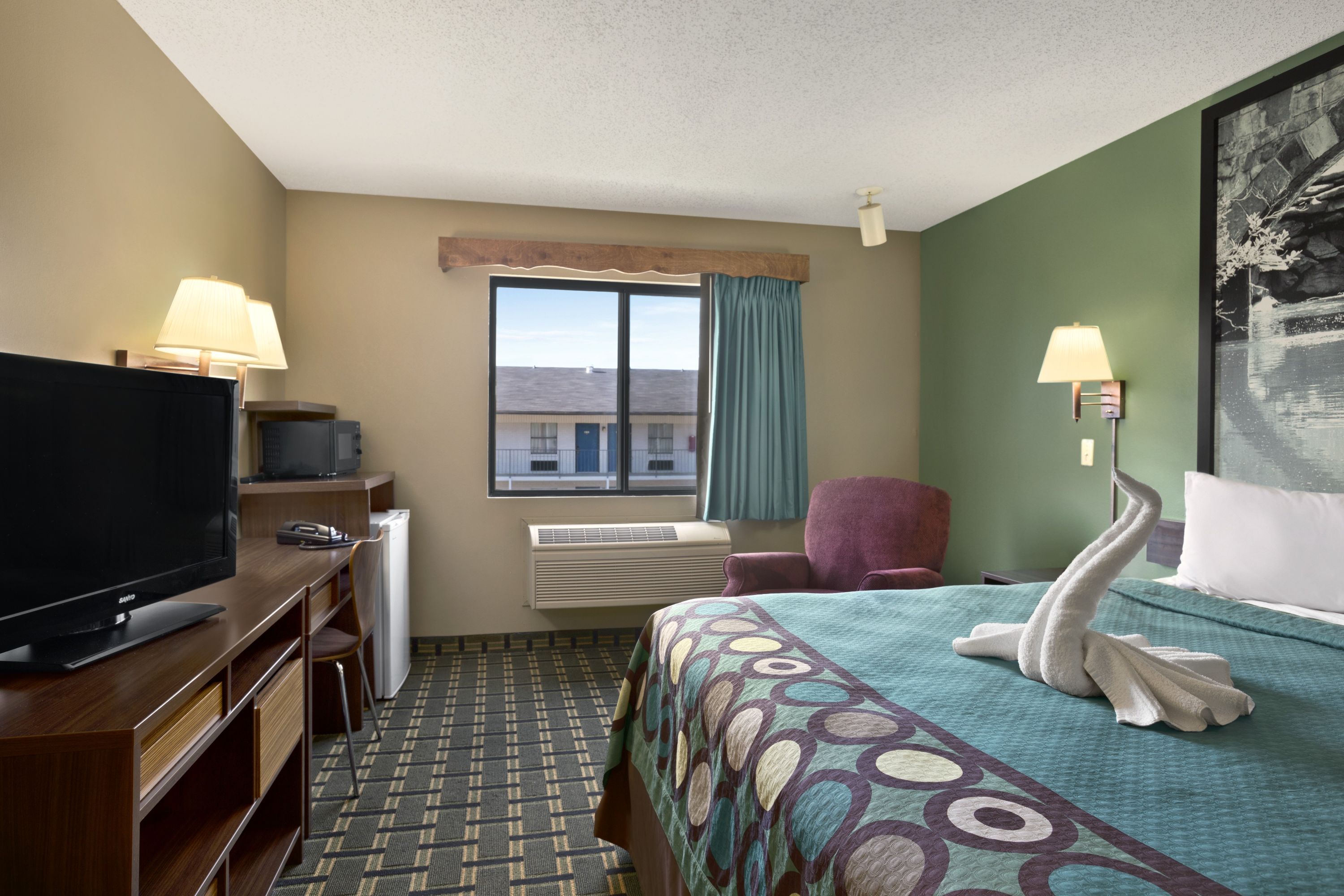 Guest room at the Super 8 by Wyndham Russellville in Russellville, Arkansas