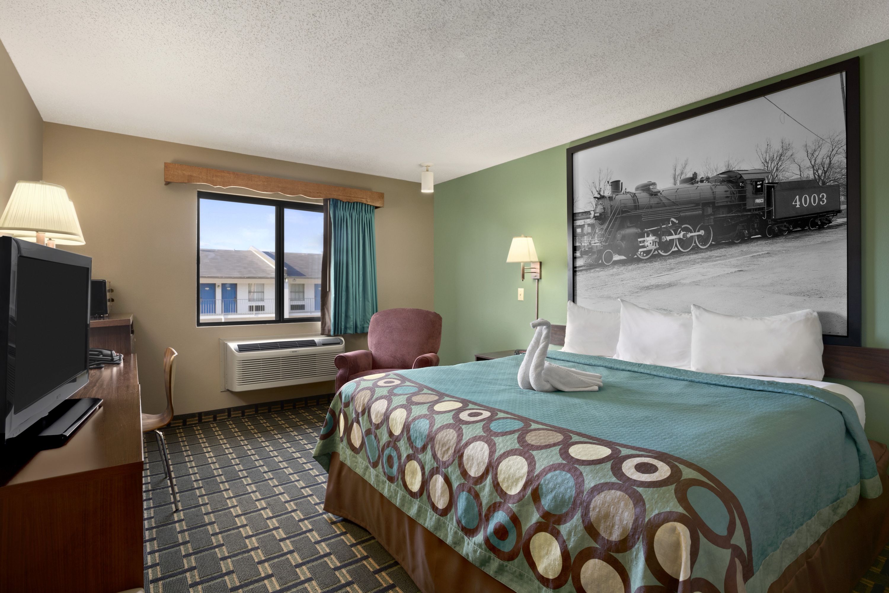 Guest room at the Super 8 by Wyndham Russellville in Russellville, Arkansas