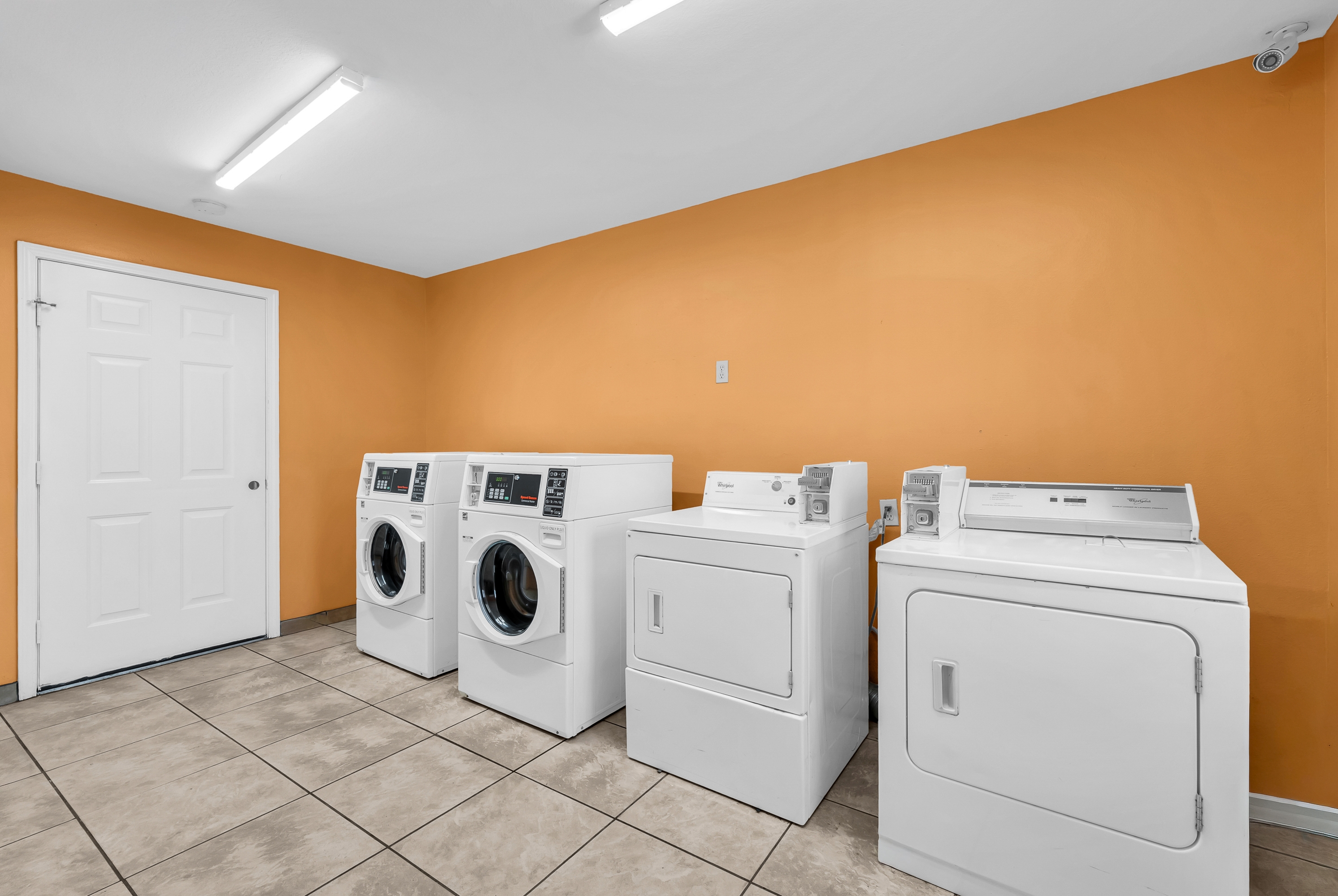 Laundry facilities at Super 8 by Wyndham Siloam Springs in Siloam Springs, Arkansas