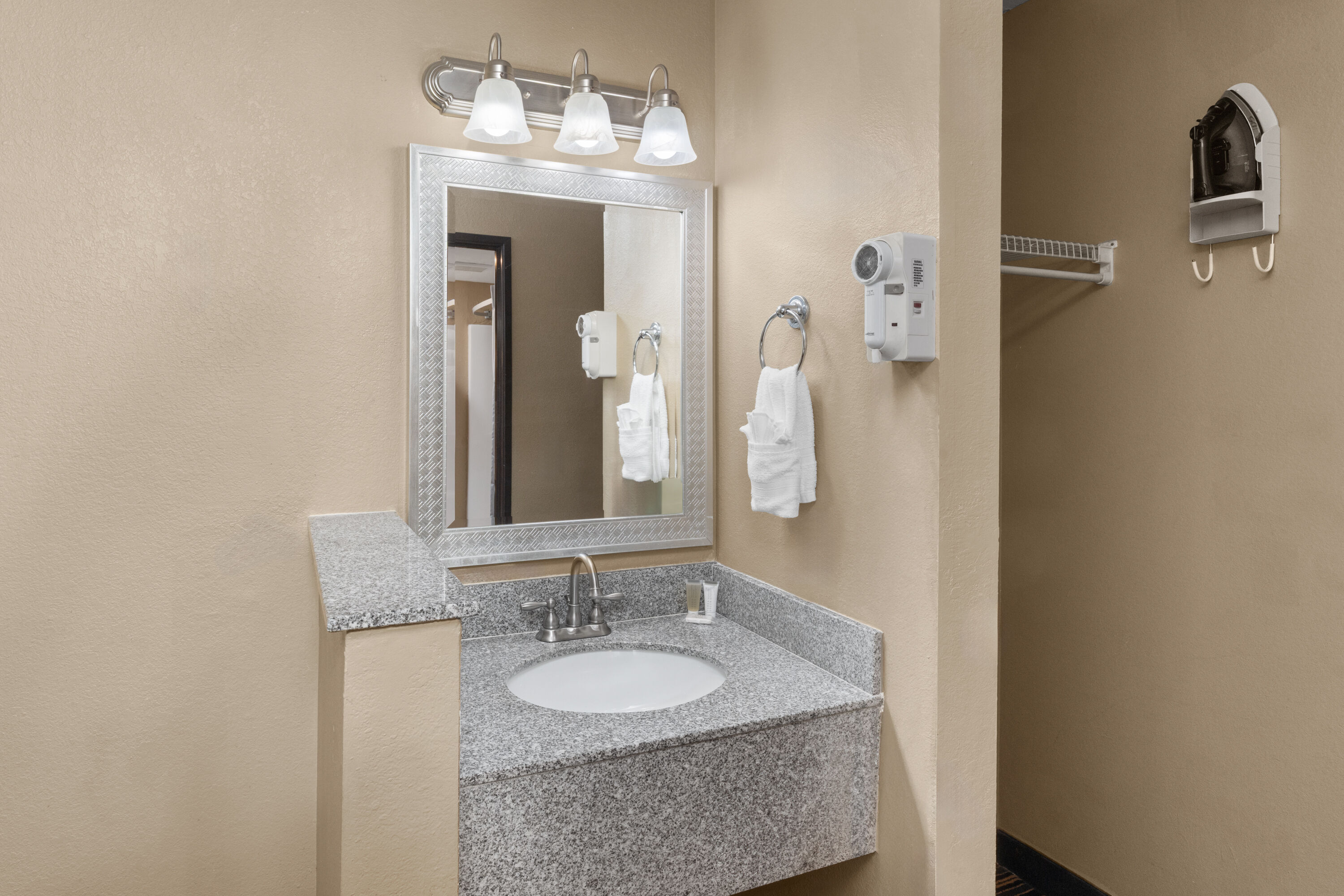 Guest room bath at the Super 8 by Wyndham Casa Grande in Casa Grande, Arizona