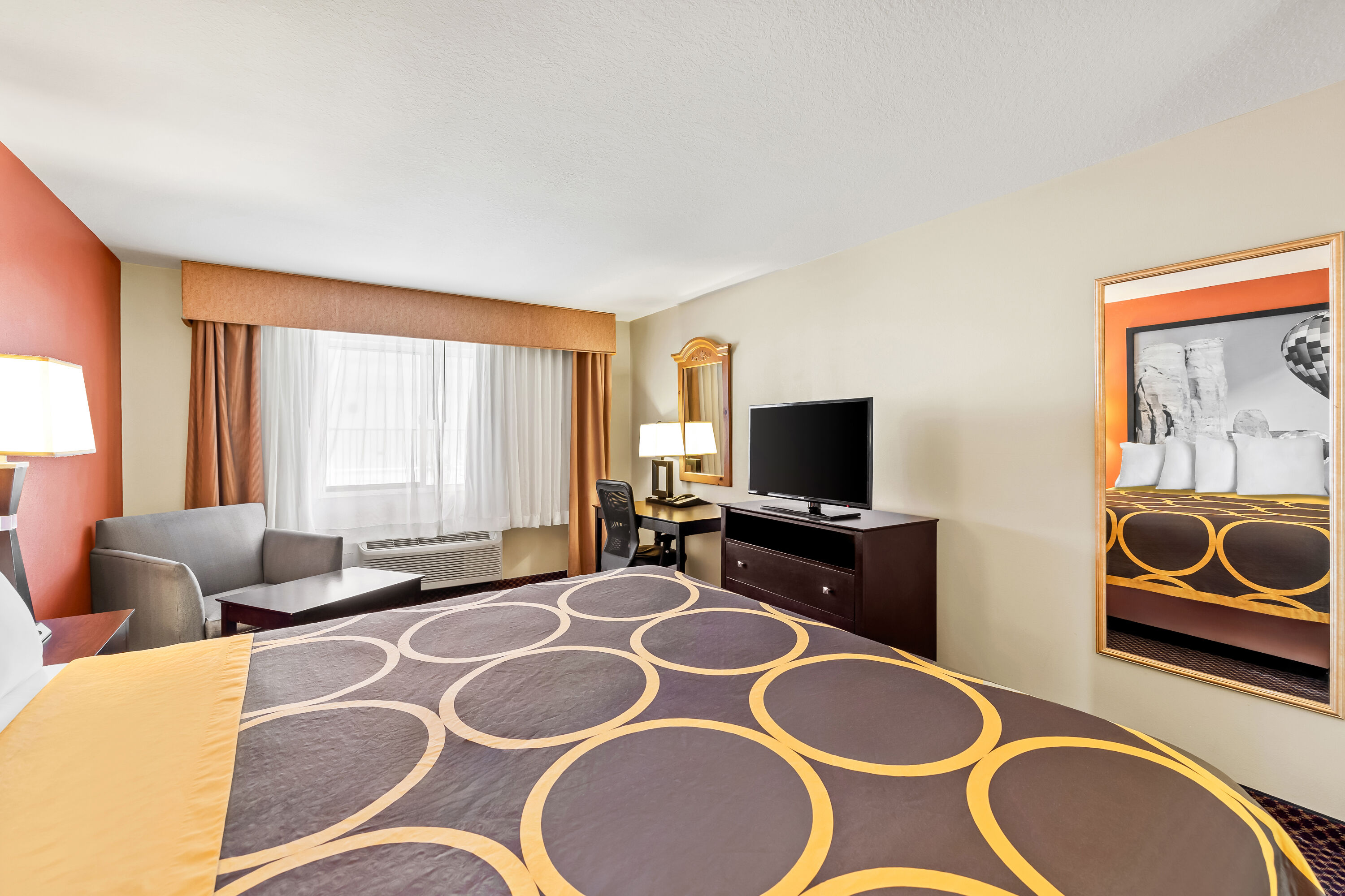 King bed guest room at the Super 8 by Wyndham Marana/Tucson Area in Marana, Arizona