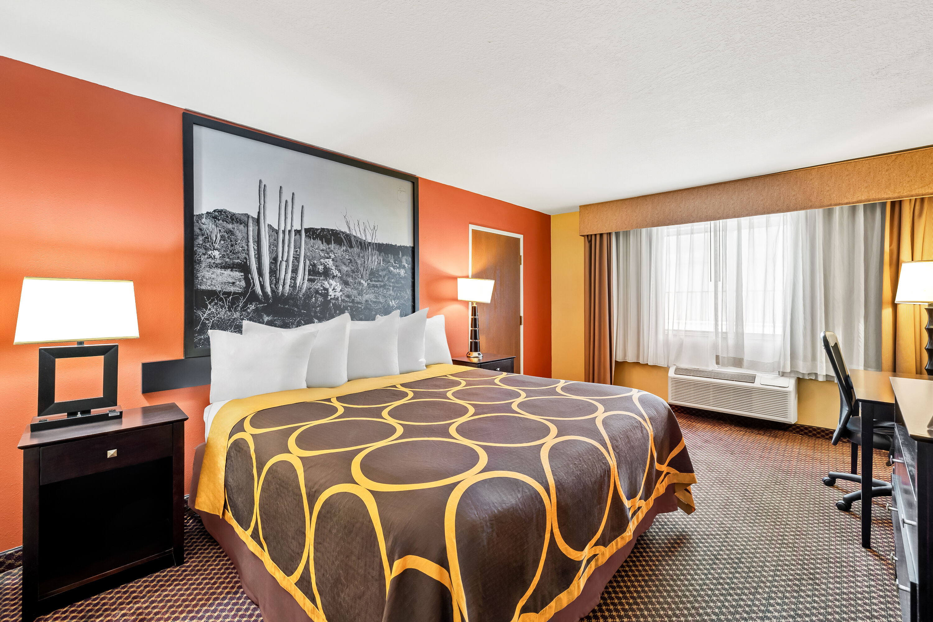 King bed guest room at the Super 8 by Wyndham Marana/Tucson Area in Marana, Arizona