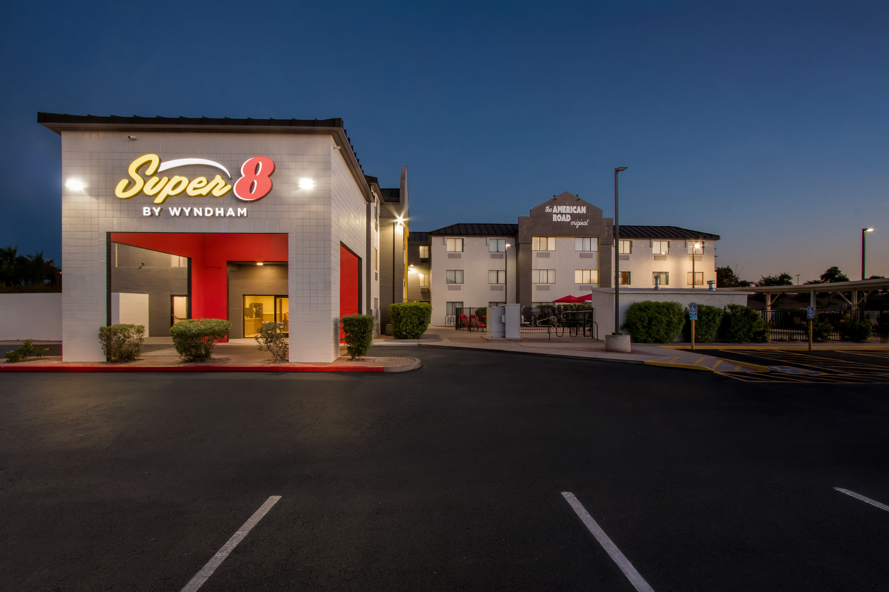 Exterior Night Image of Super 8 by Wyndham - Mesa/Gilbert hotel in Mesa, Arizona
