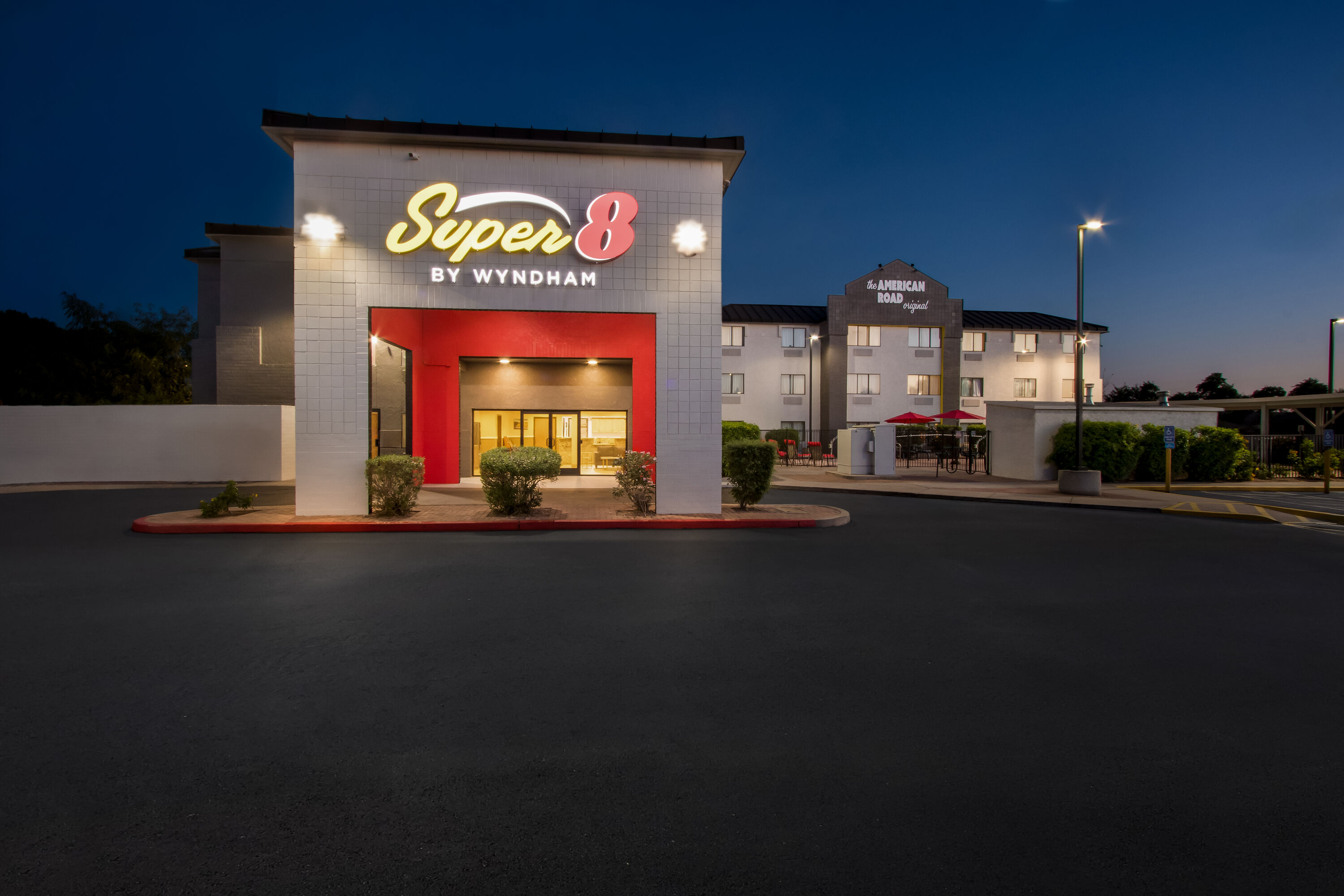 Exterior Night Image of Super 8 by Wyndham - Mesa/Gilbert hotel in Mesa, Arizona