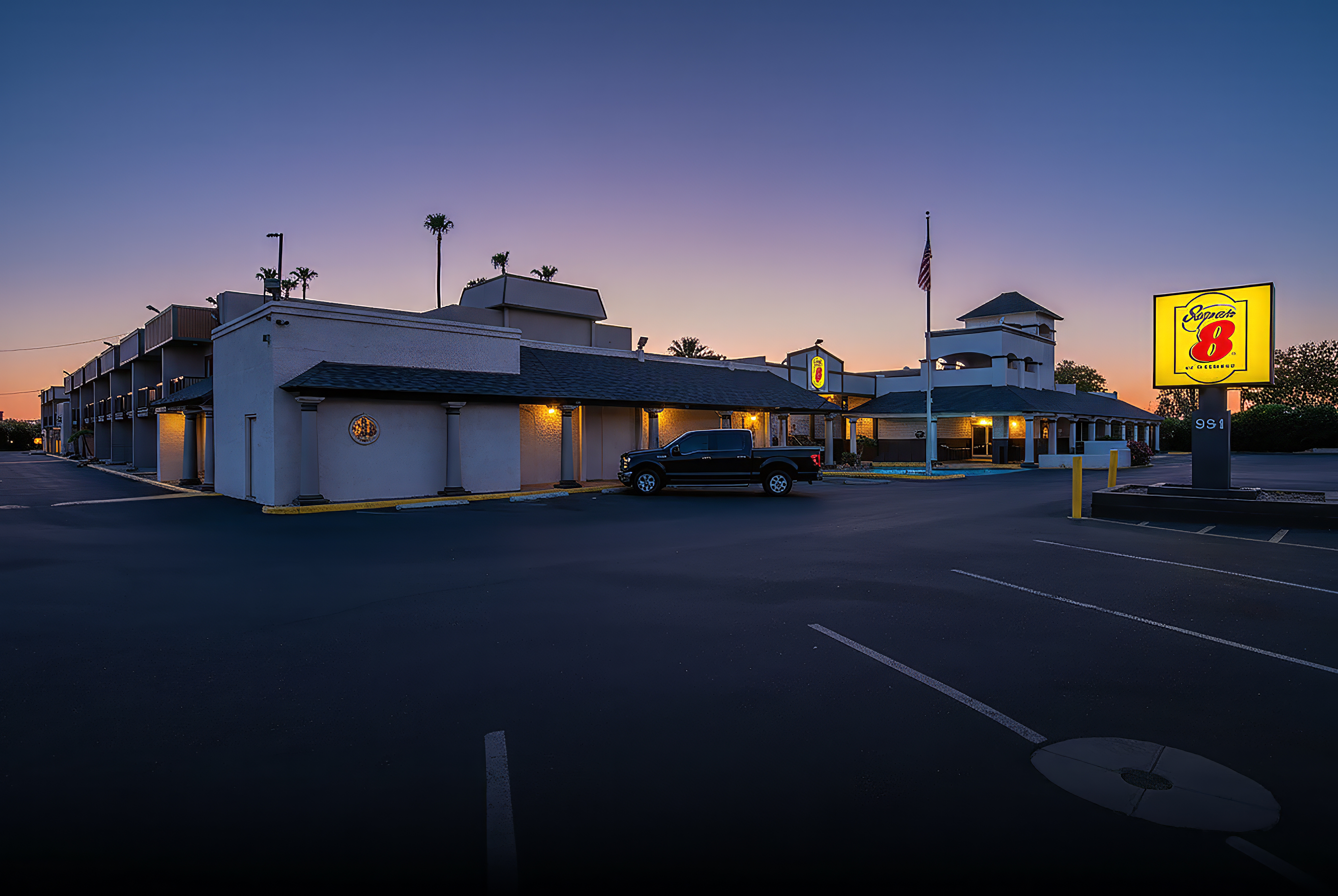 Exterior Night Image of Super 8 by Wyndham Mesa Downtown Near Convention Center hotel in Mesa, Arizona