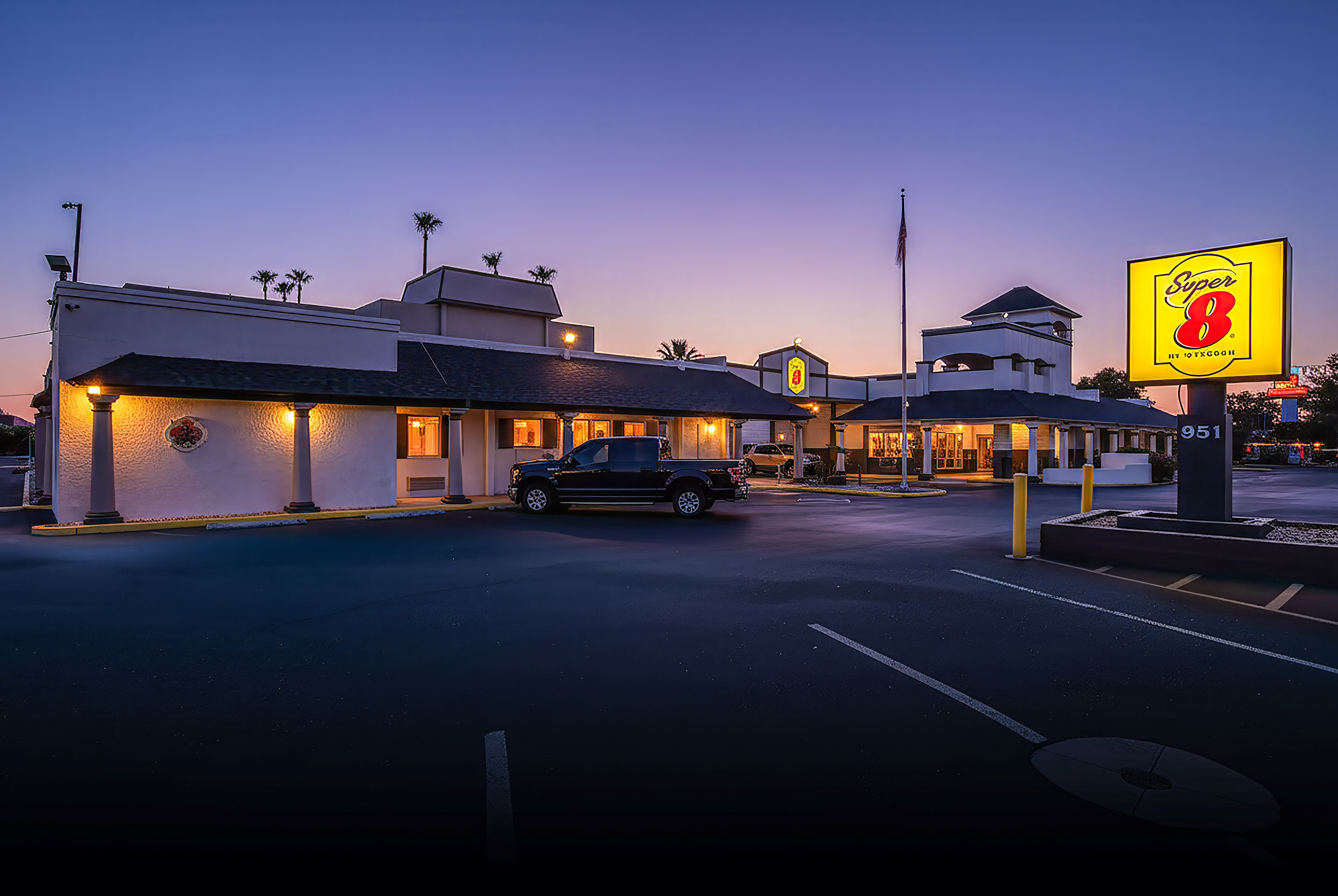 Exterior Night Image of Super 8 by Wyndham Mesa Downtown Near Convention Center hotel in Mesa, Arizona