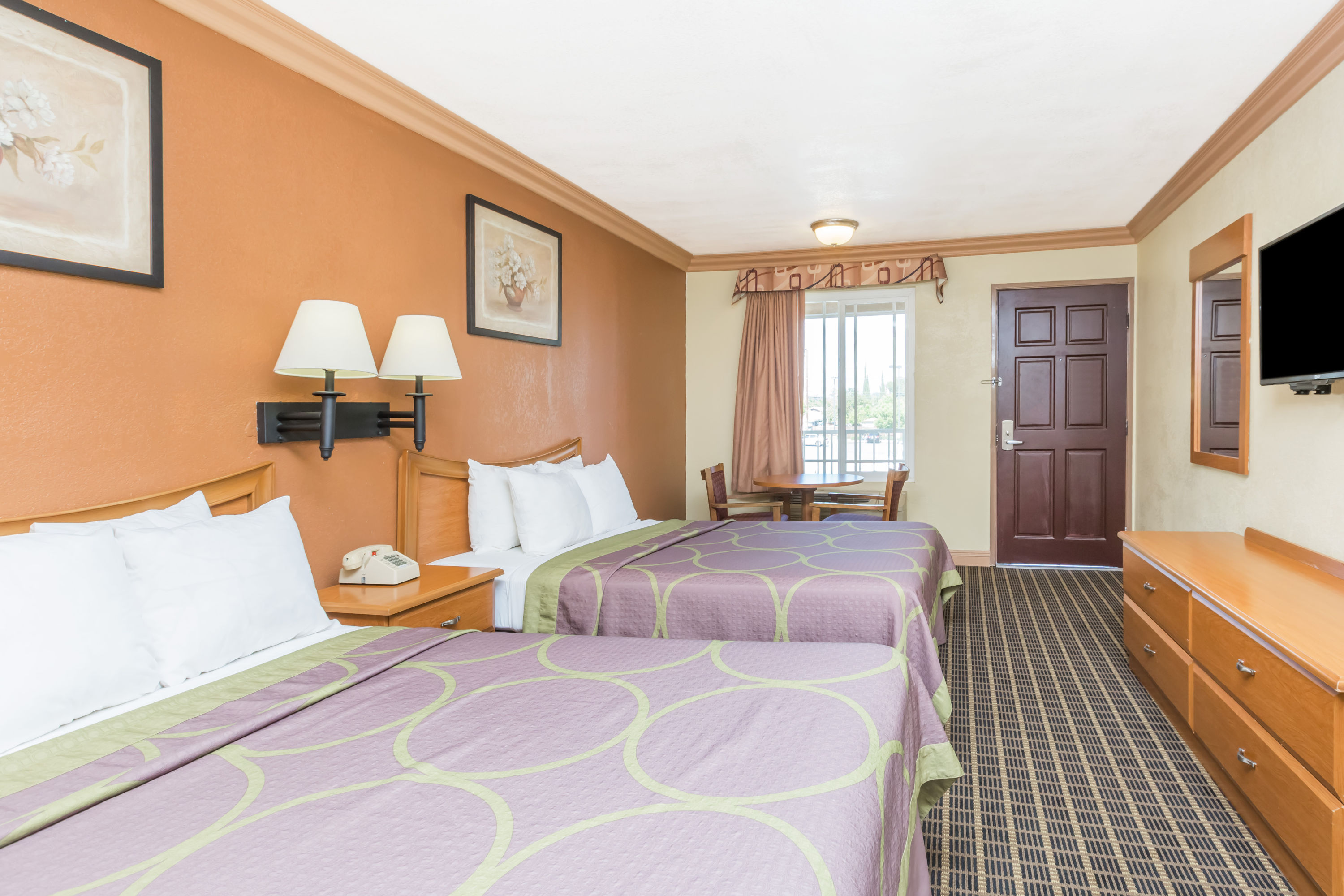 Guest room at the Super 8 by Wyndham Azusa in Azusa, California