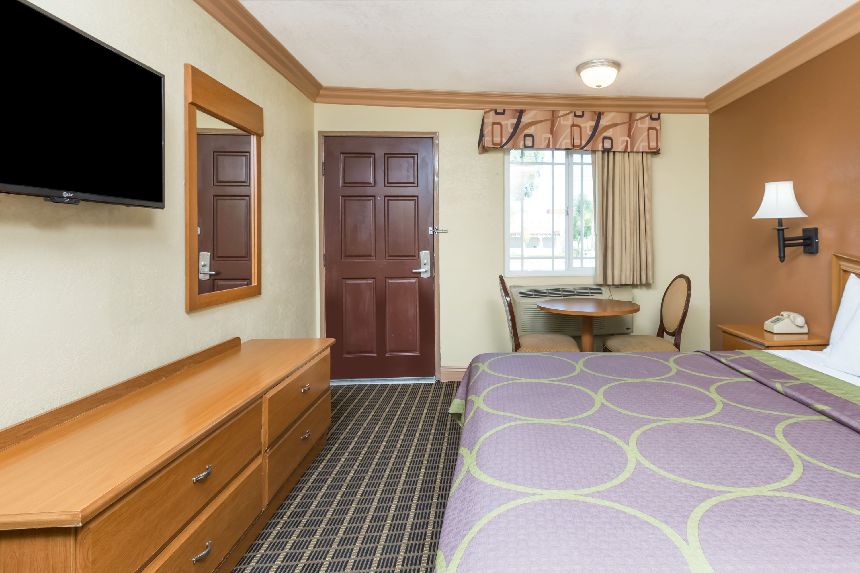 Guest room at the Super 8 by Wyndham Azusa in Azusa, California