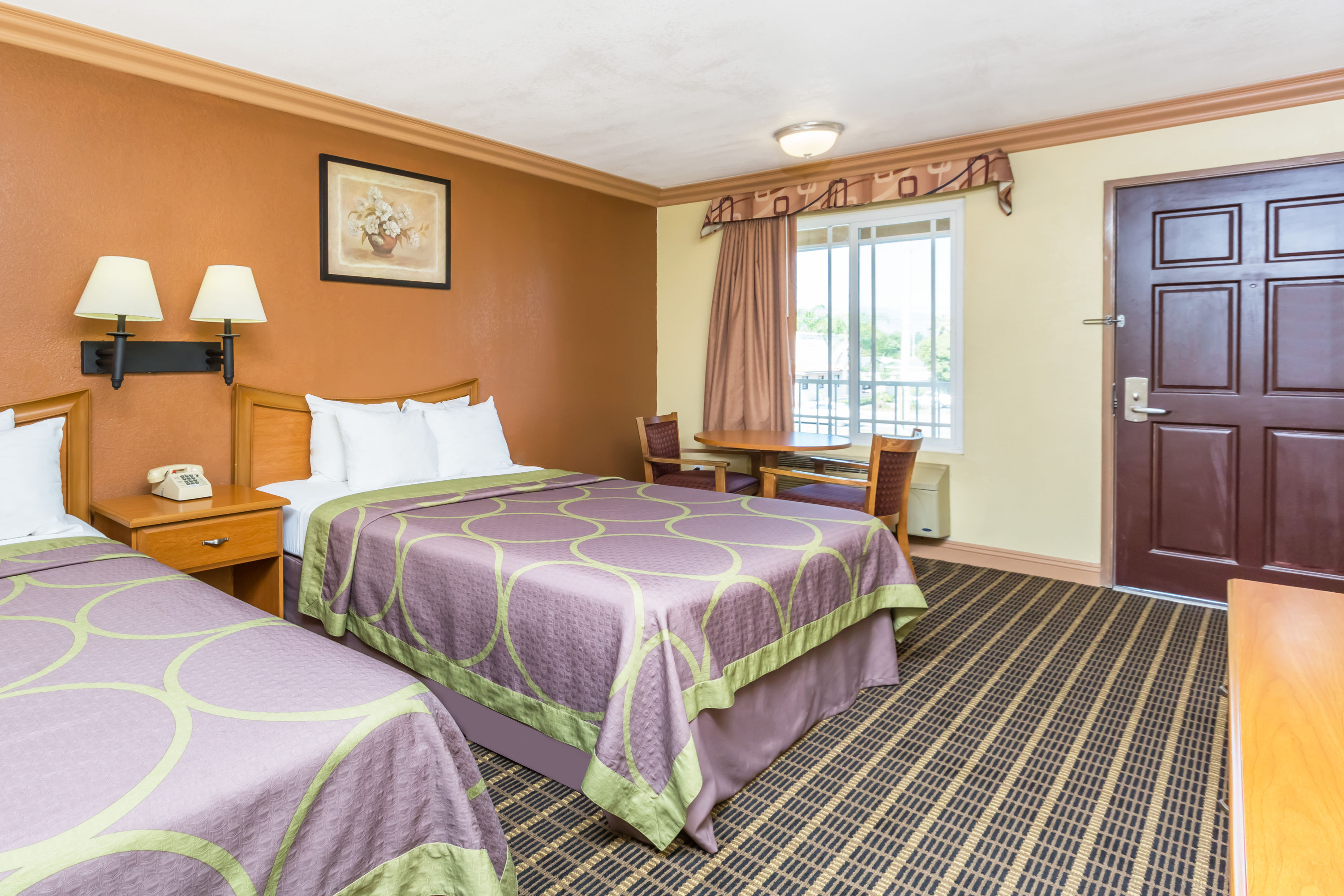 Guest room at the Super 8 by Wyndham Azusa in Azusa, California