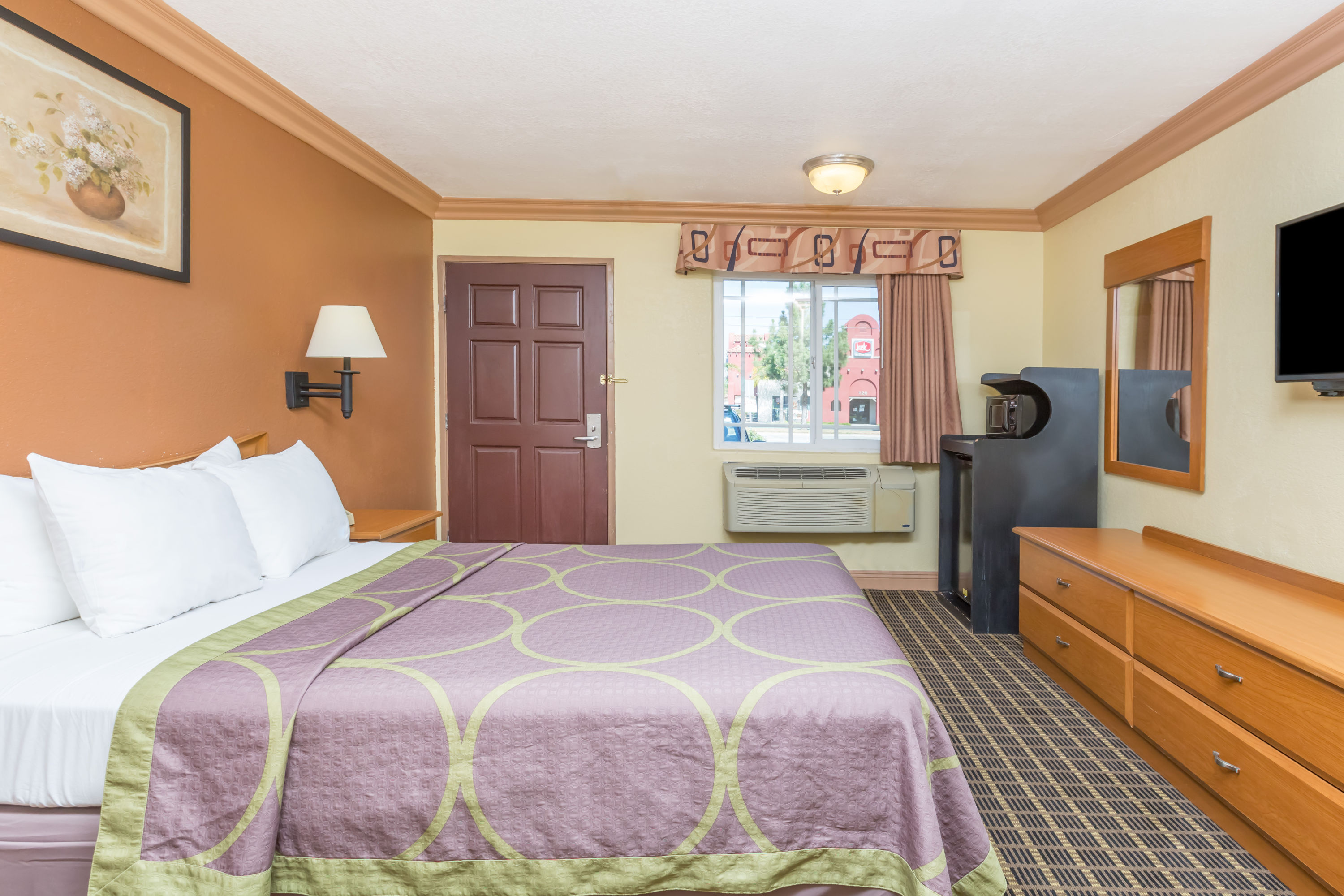 Guest room at the Super 8 by Wyndham Azusa in Azusa, California