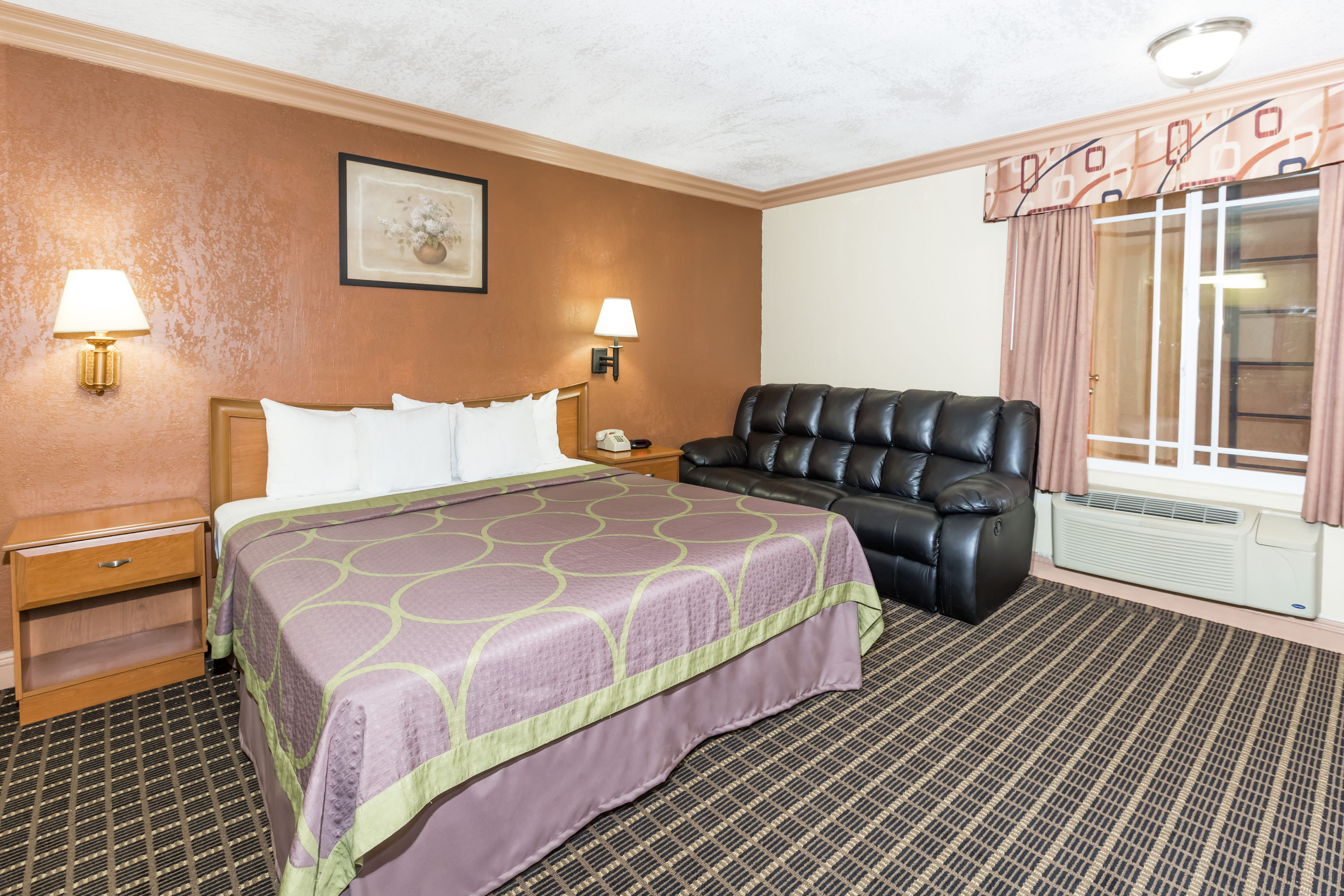 Guest room at the Super 8 by Wyndham Azusa in Azusa, California