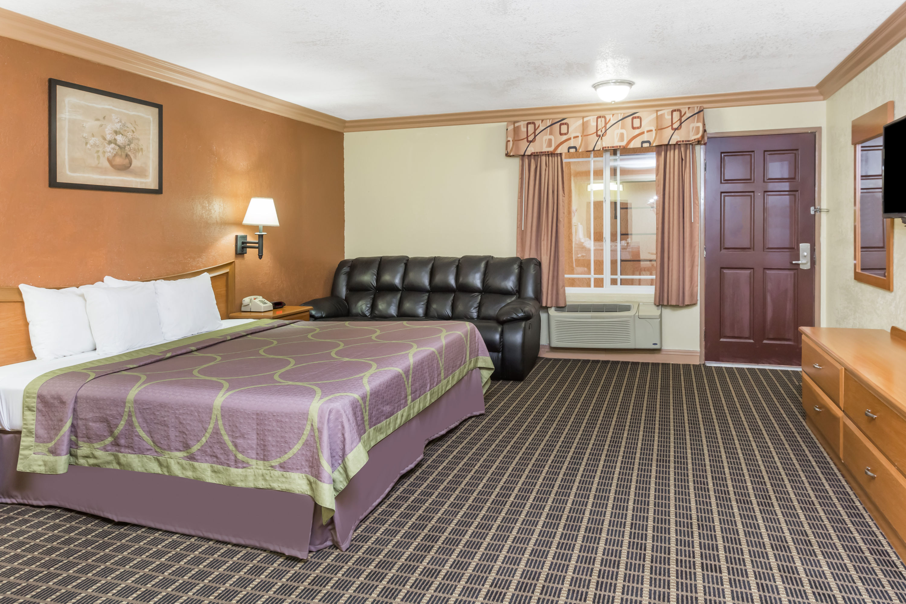 Guest room at the Super 8 by Wyndham Azusa in Azusa, California