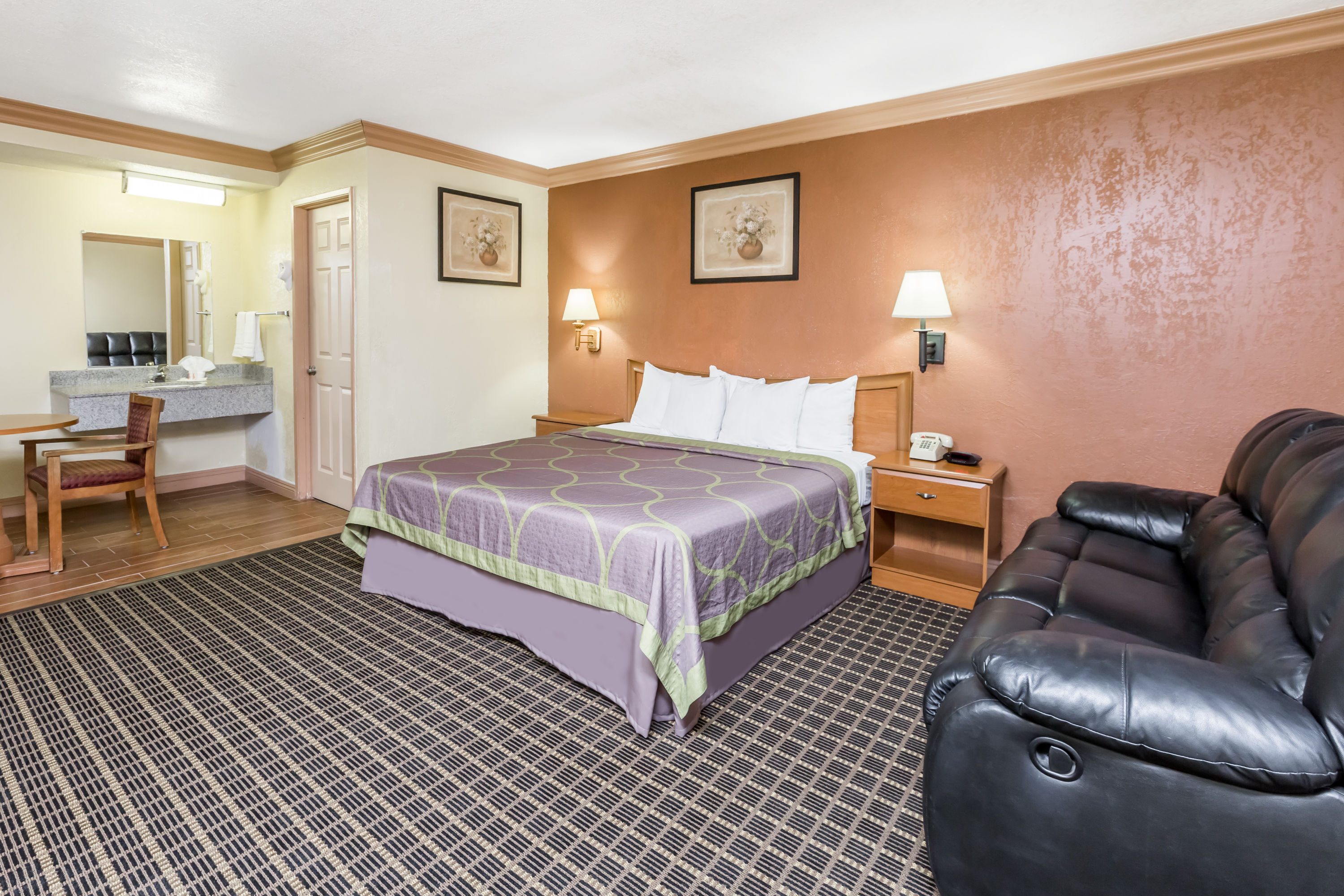 Guest room at the Super 8 by Wyndham Azusa in Azusa, California