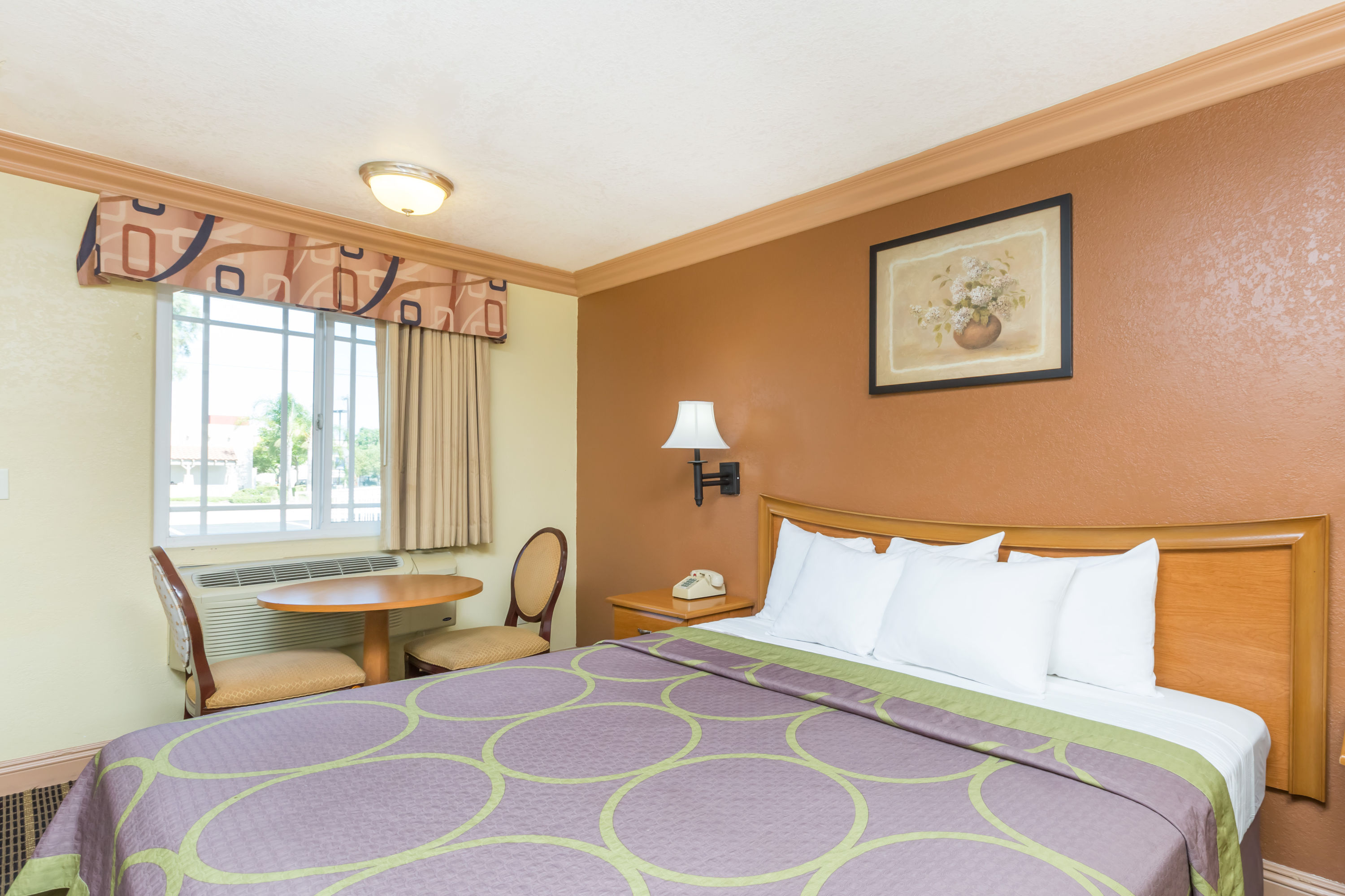 Guest room at the Super 8 by Wyndham Azusa in Azusa, California