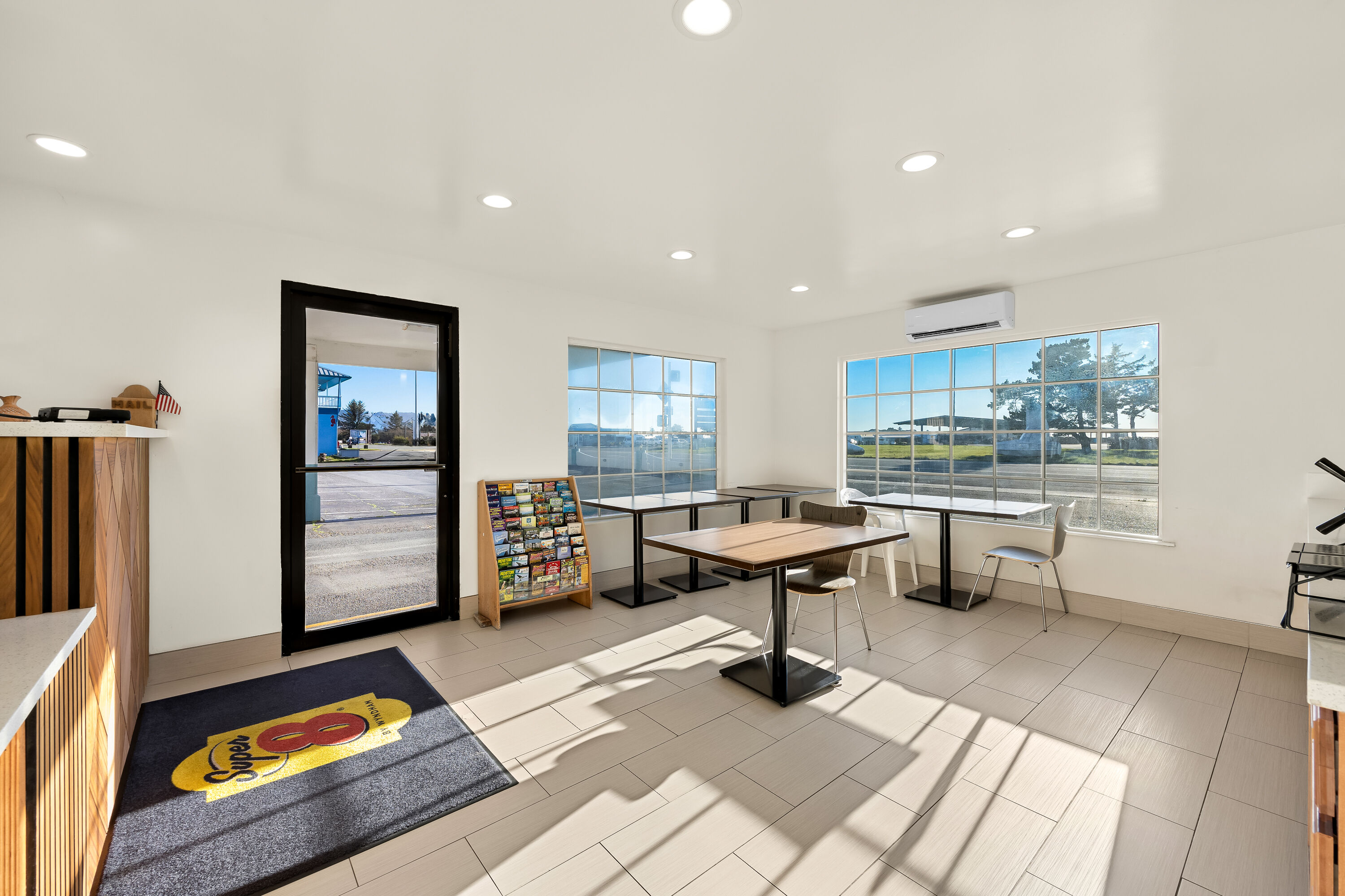 Super 8 by Wyndham Crescent City restaurant breakfast area with seating in Crescent City, California