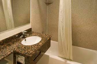 Guest room at the Super 8 Fresno Convention Centre Area in Fresno, California
