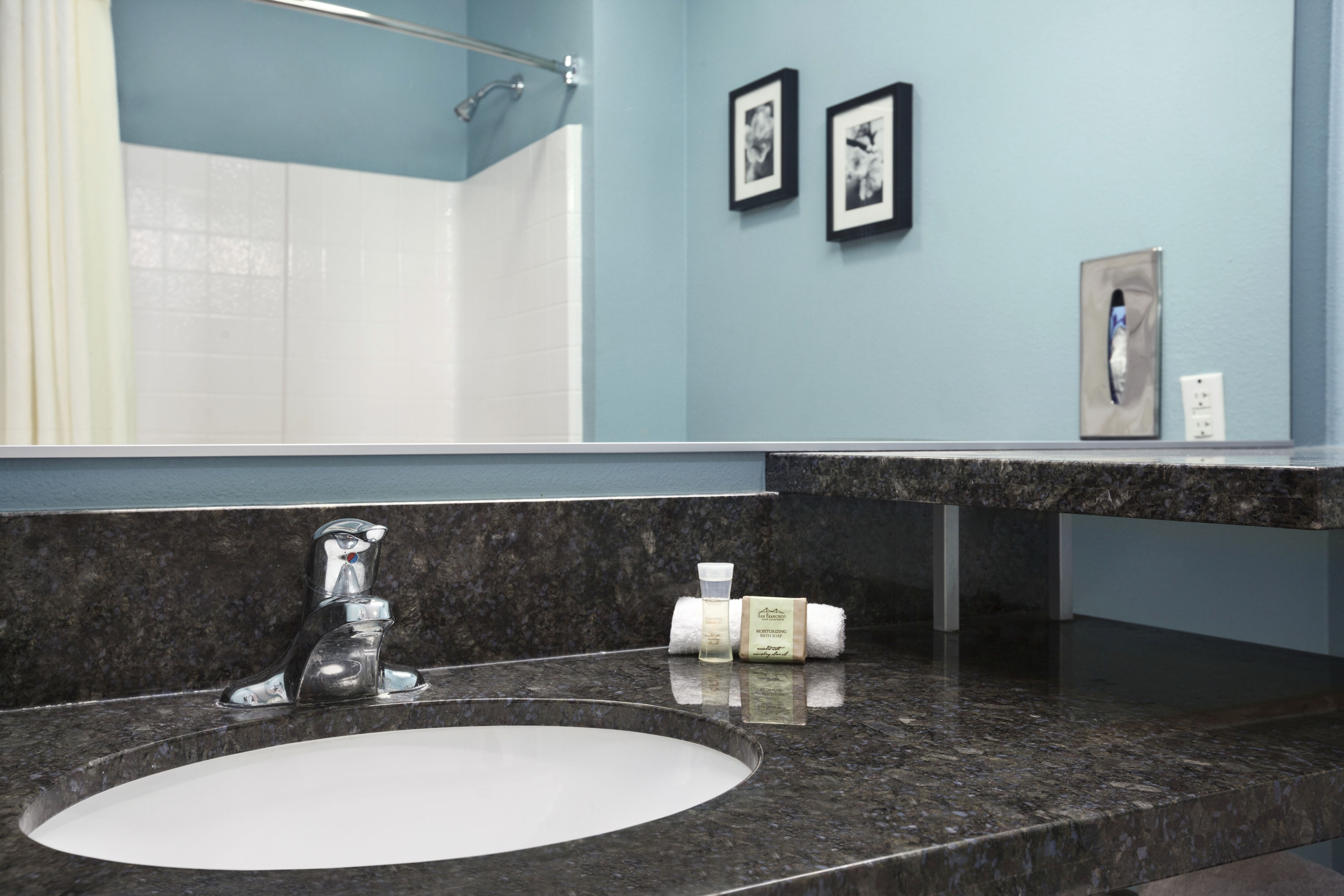 Guest room bath at the Super 8 by Wyndham Indio in Indio, California