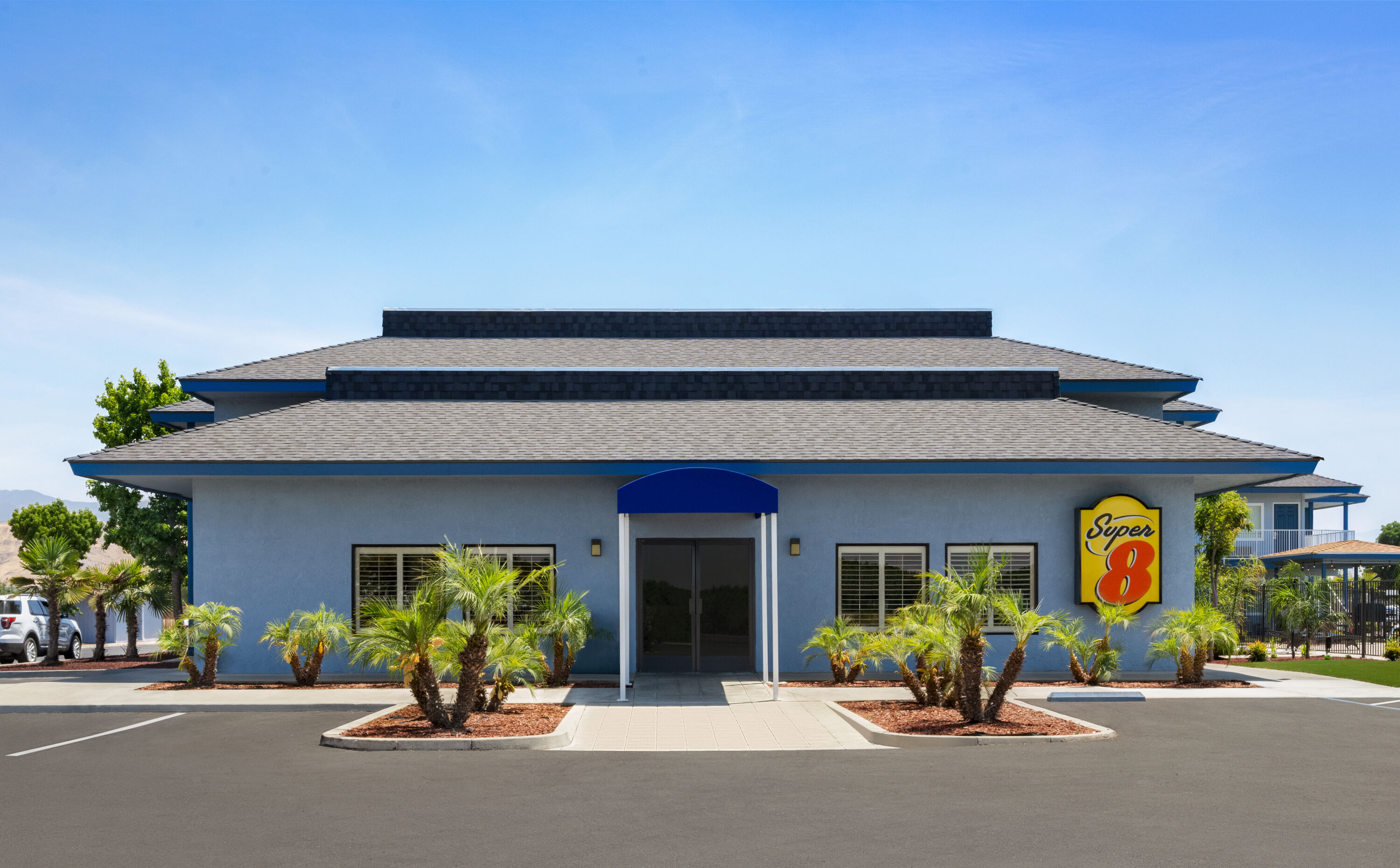 Exterior of Super 8 by Wyndham Lindsay Olive Tree hotel in Lindsay, California